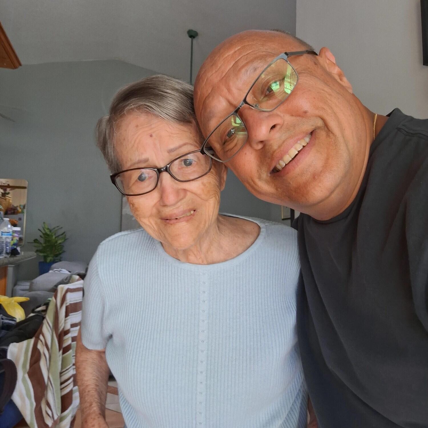 A man and woman taking a selfie