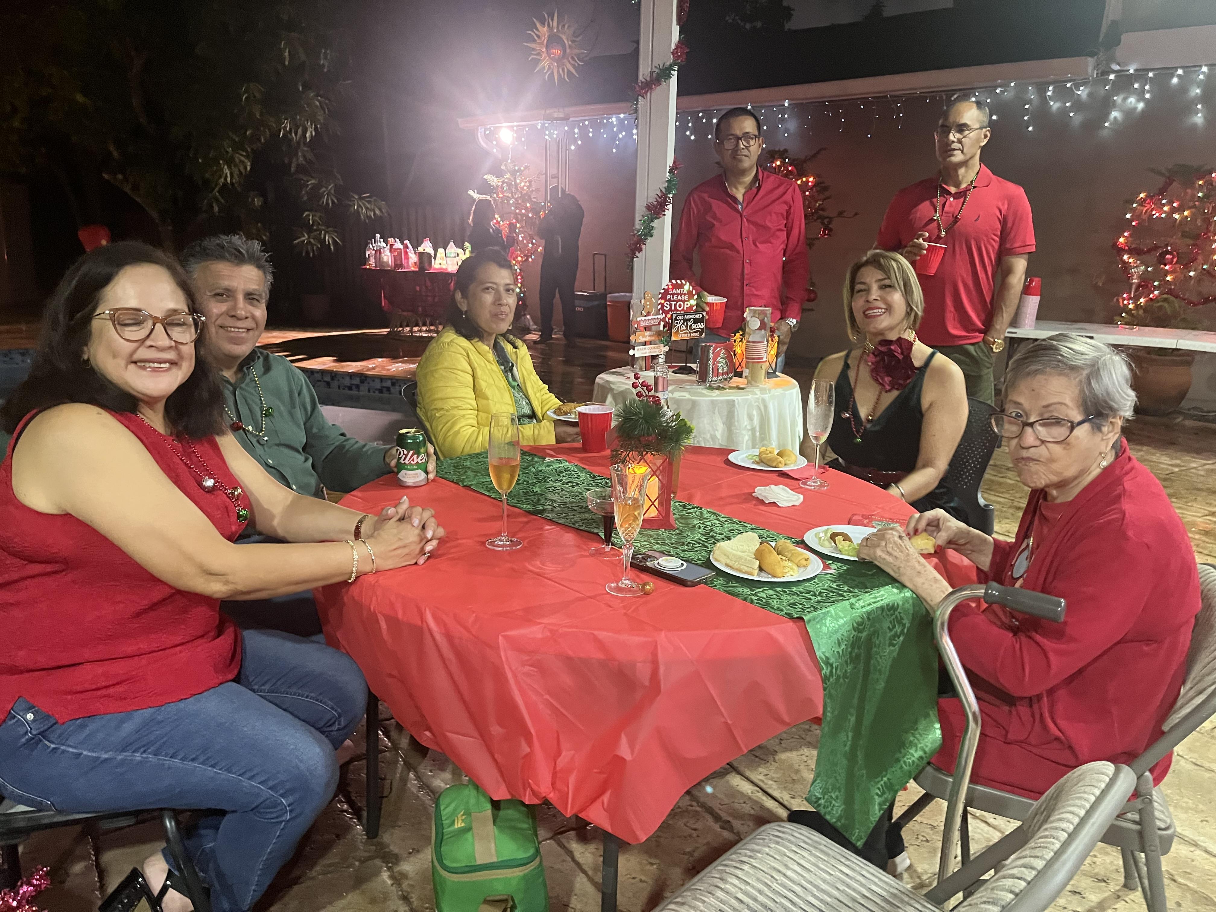 A group of people sitting at a table