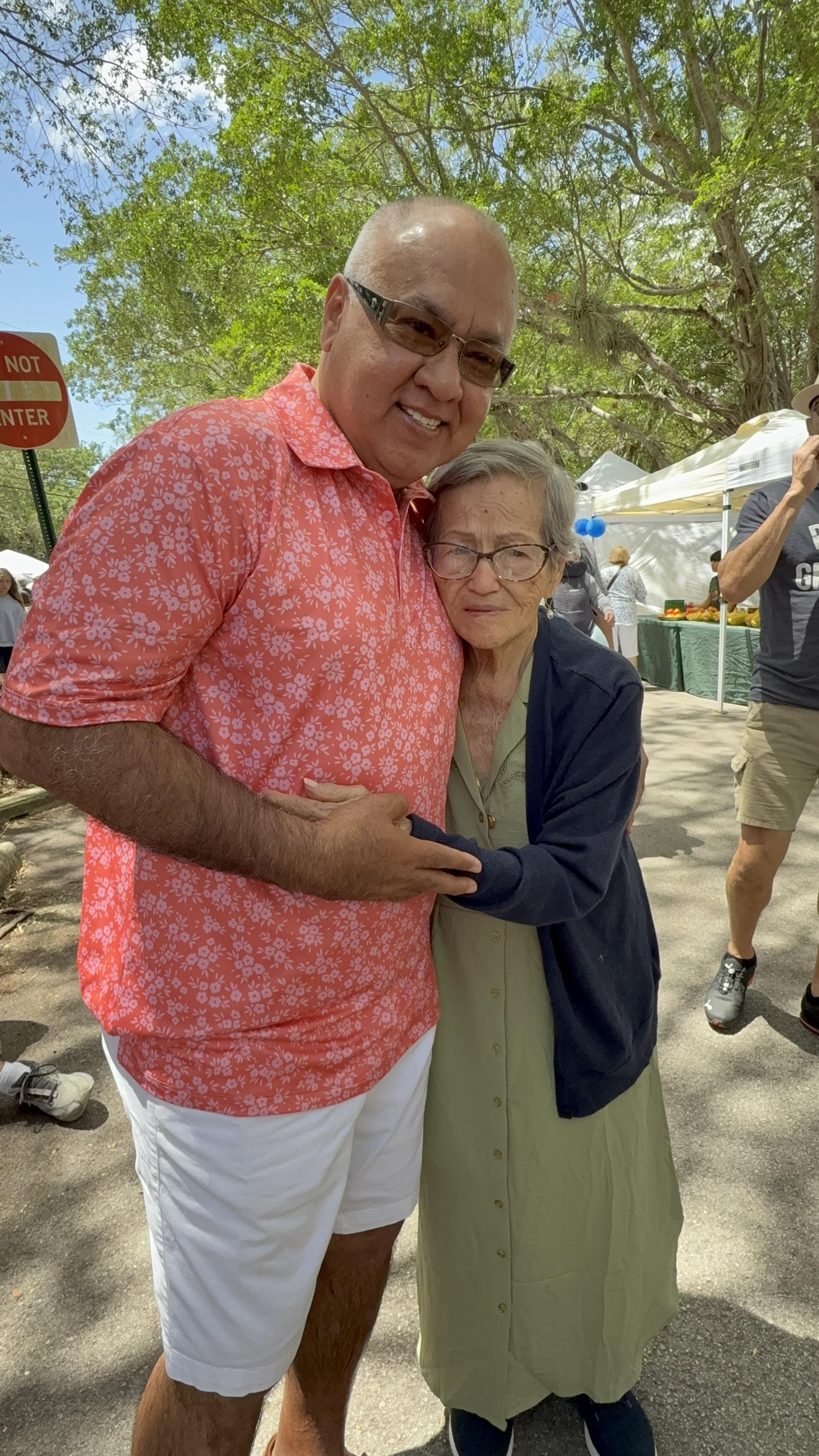 A man and woman posing for a picture