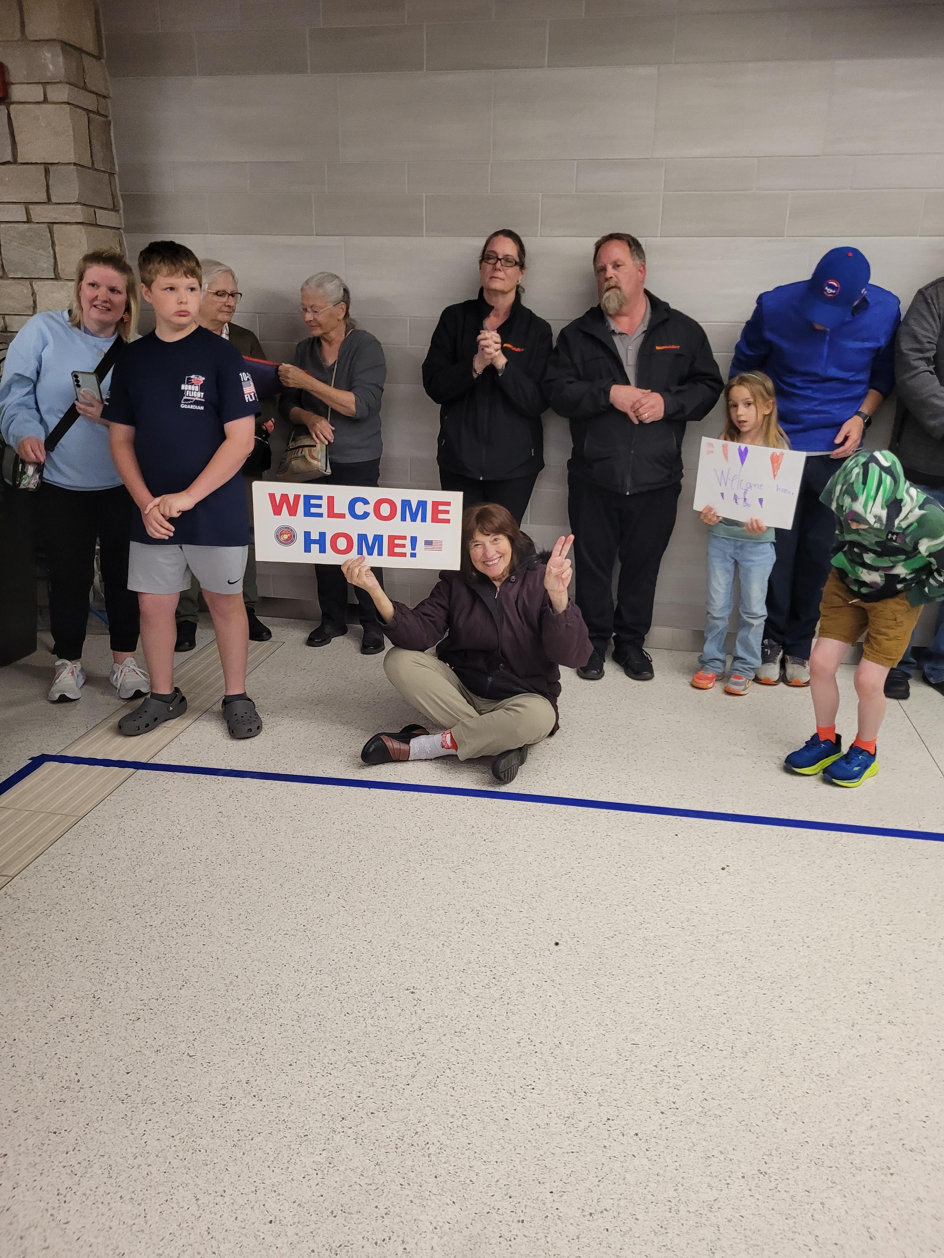 A group of people holding signs