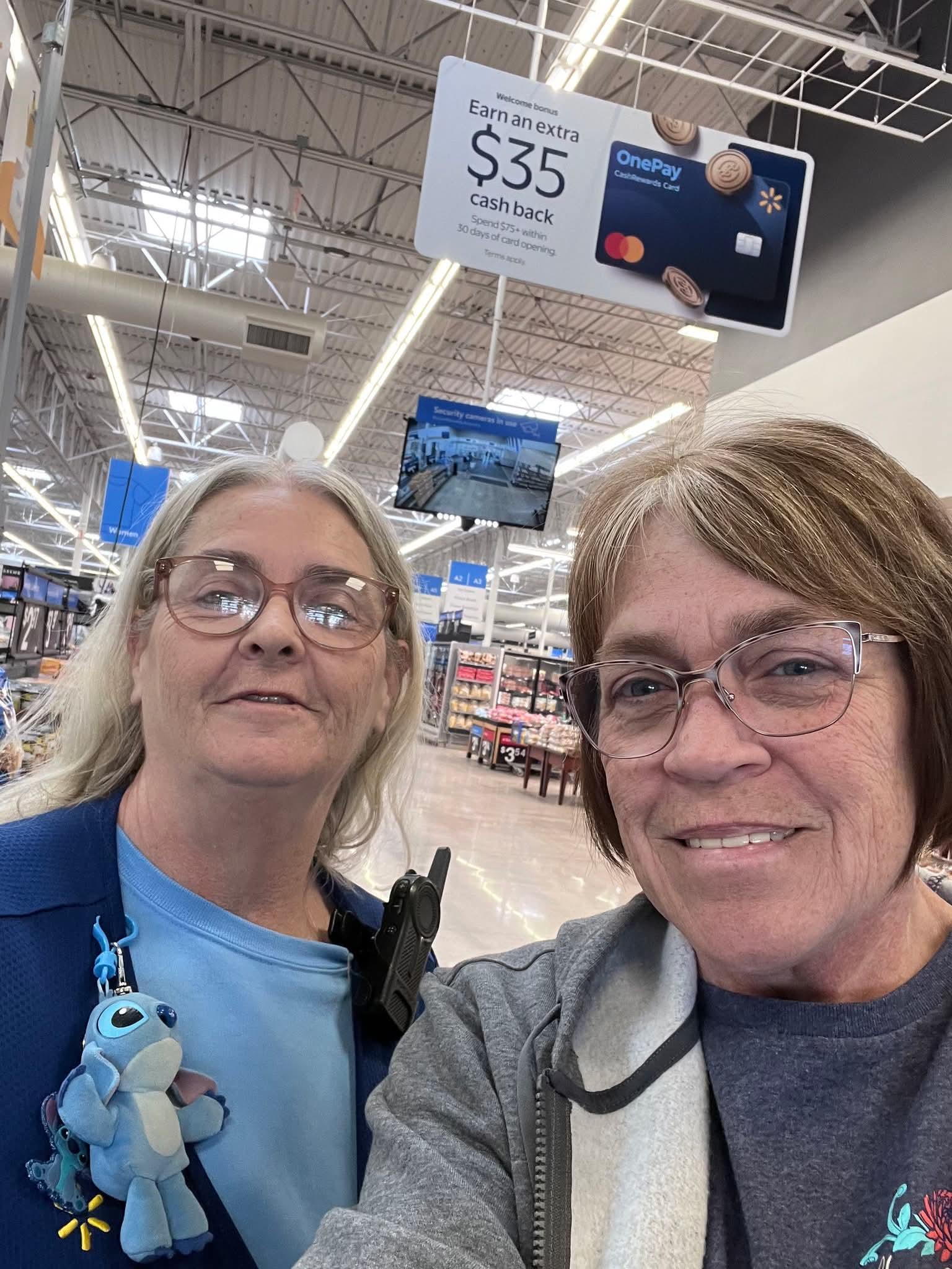 Two women taking a selfie in a store