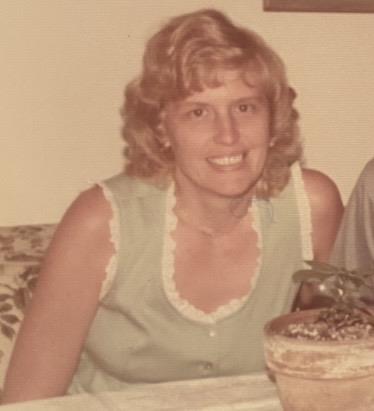 A woman sitting at a table