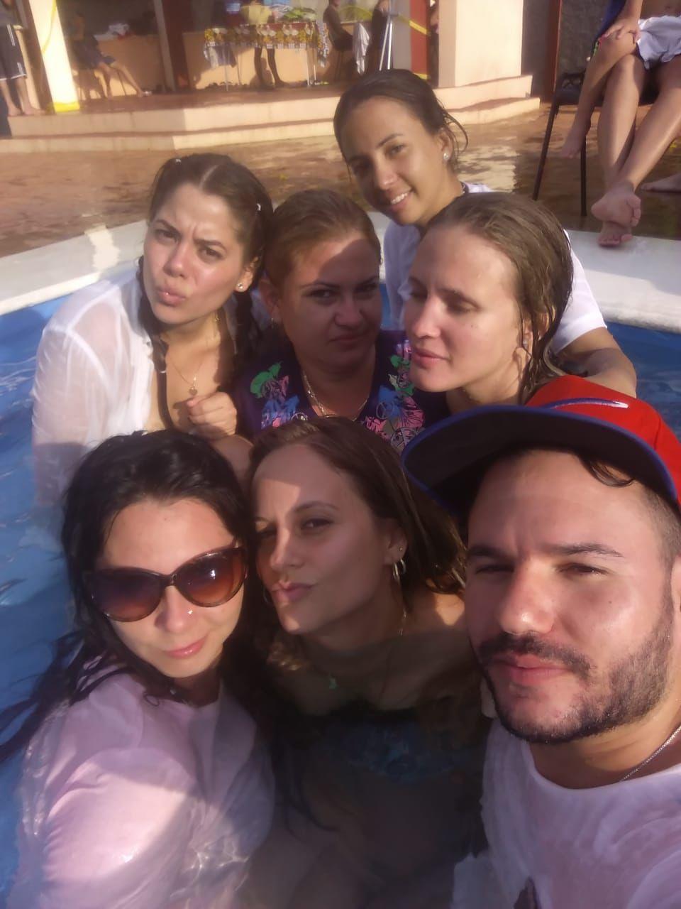 A group of people posing for a photo