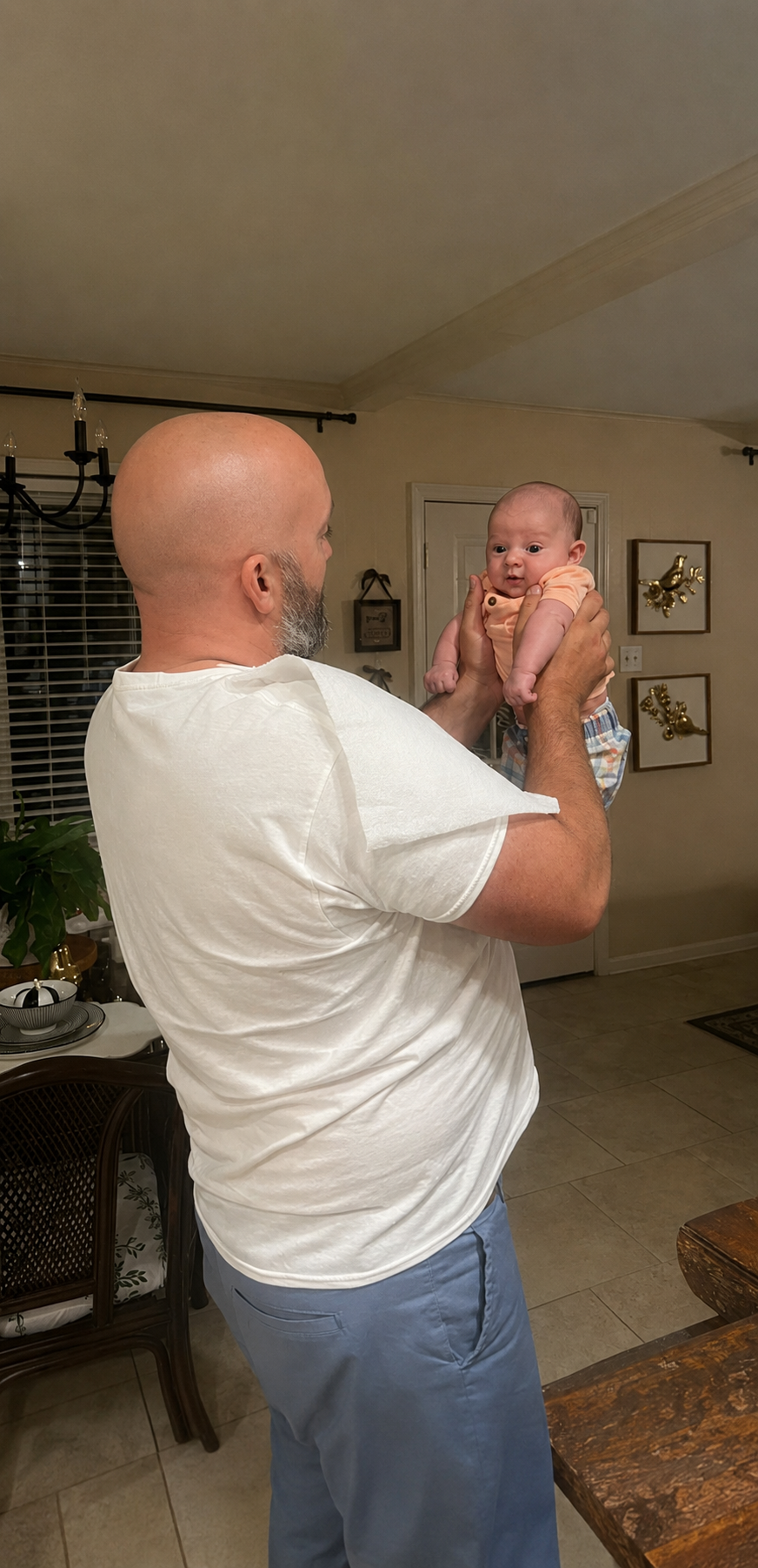 A man holding a baby