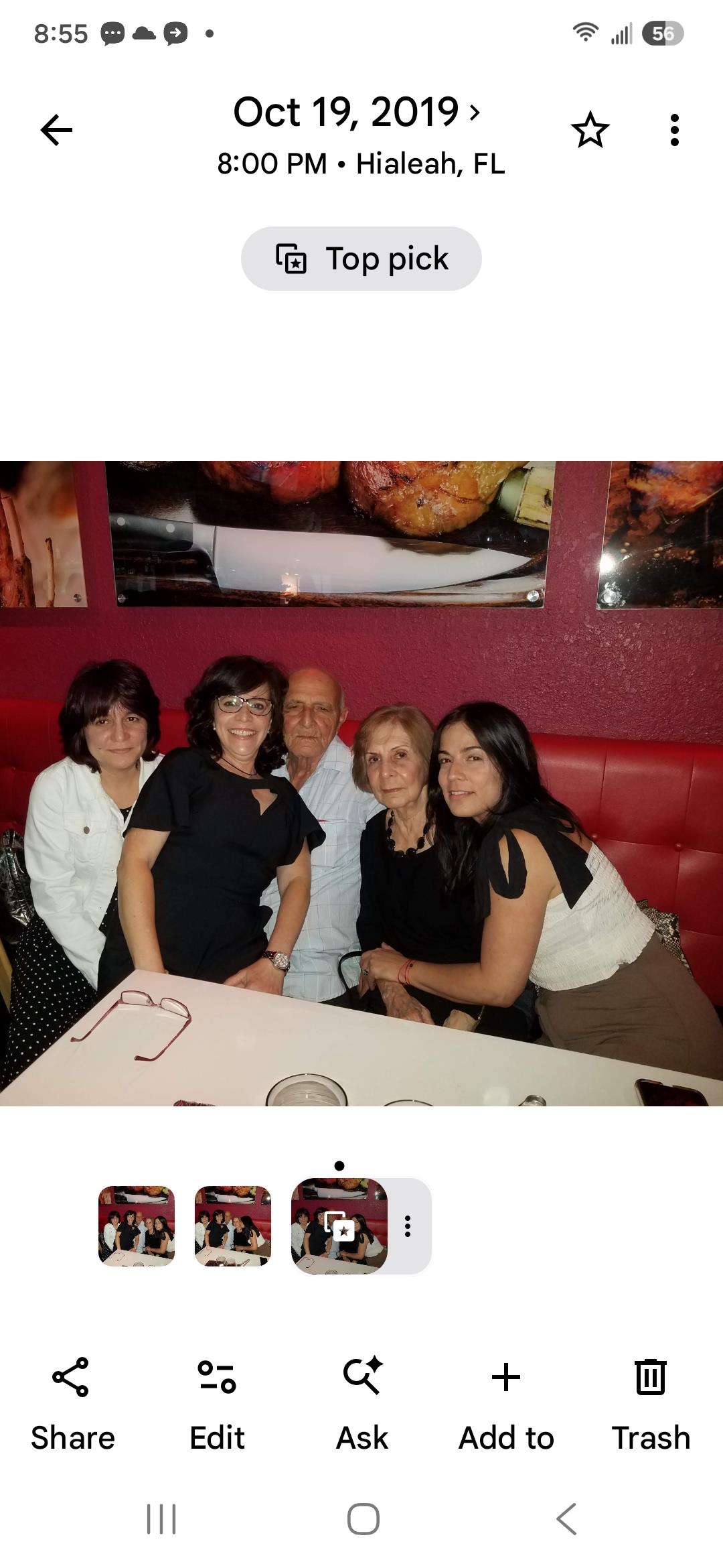 A group of people sitting at a table