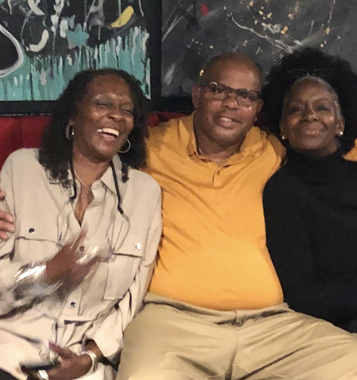 A group of people sitting on a couch