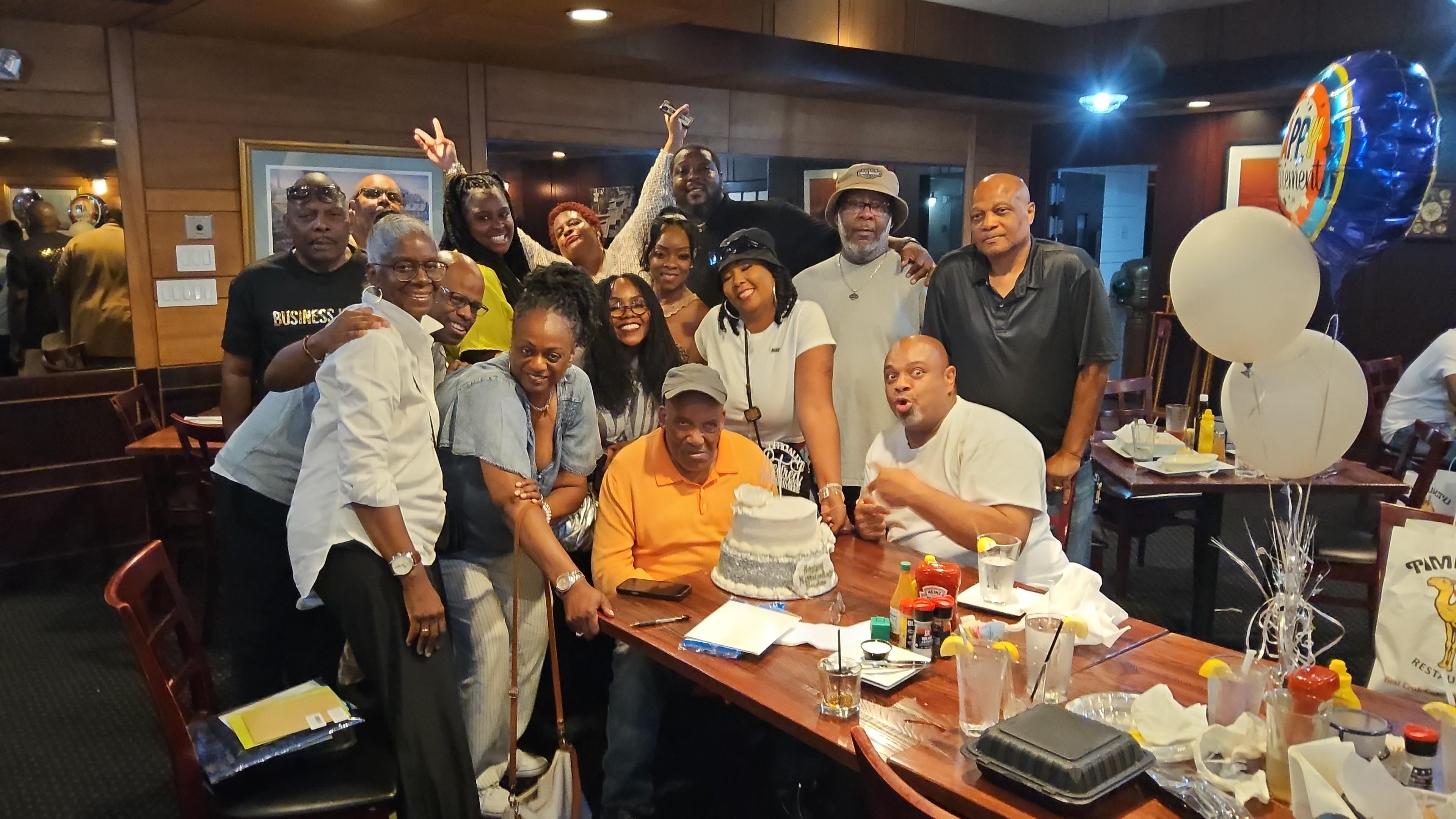 A group of people around a table