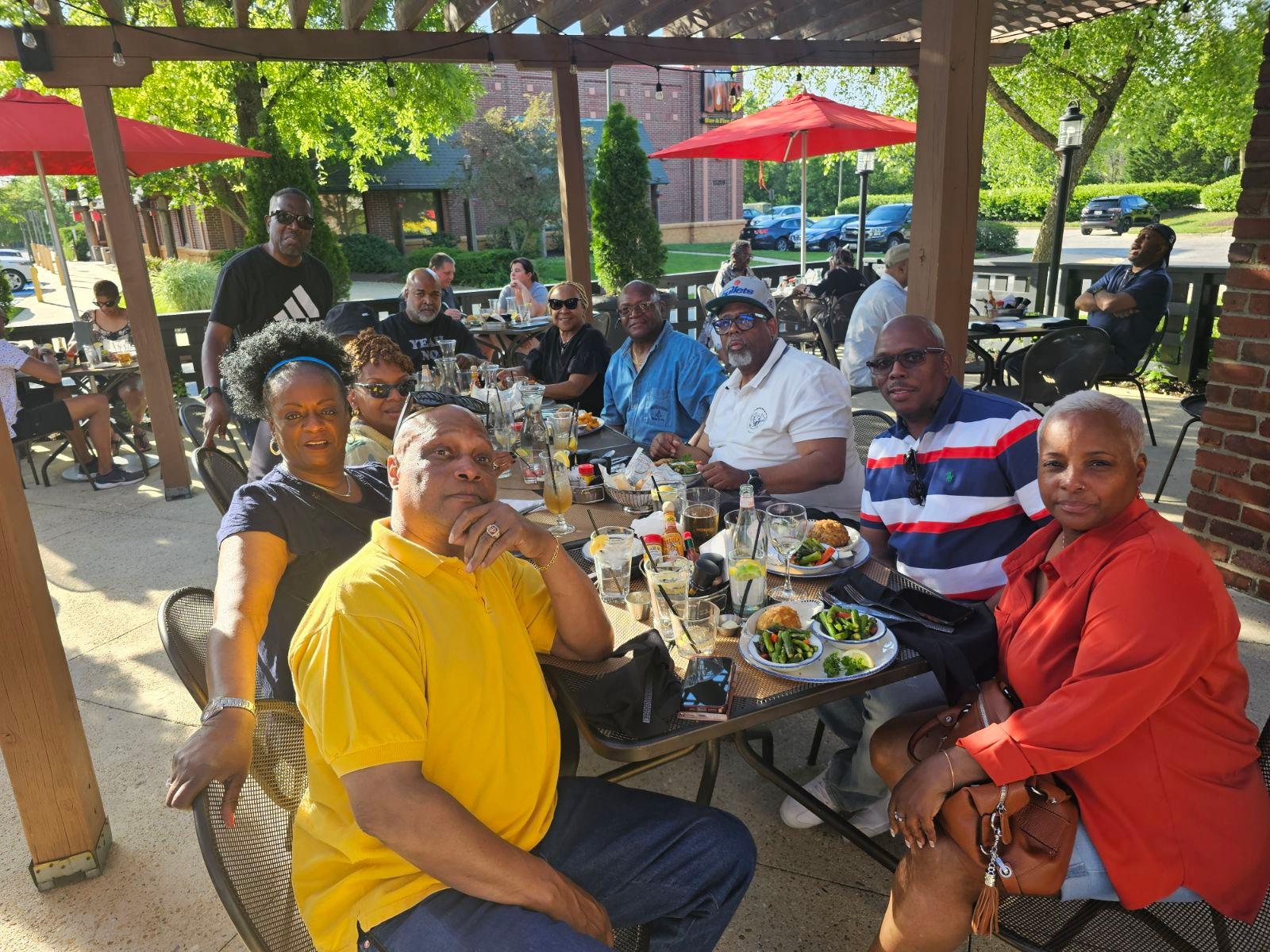 A group of people sitting at a table