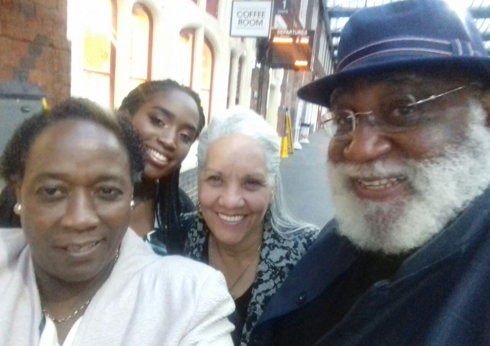 A group of people posing for a selfie