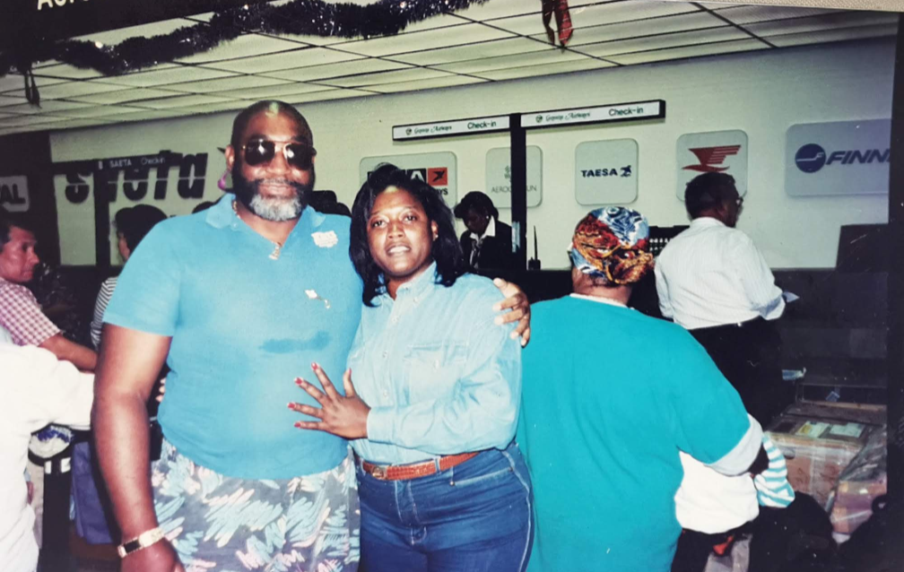 A man and woman posing for a picture