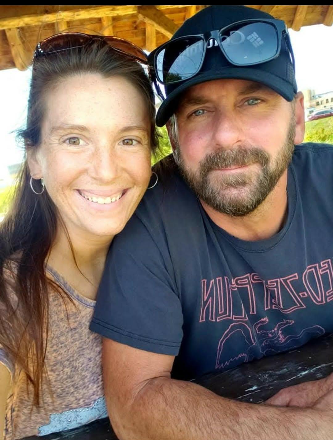 A man and woman taking a selfie