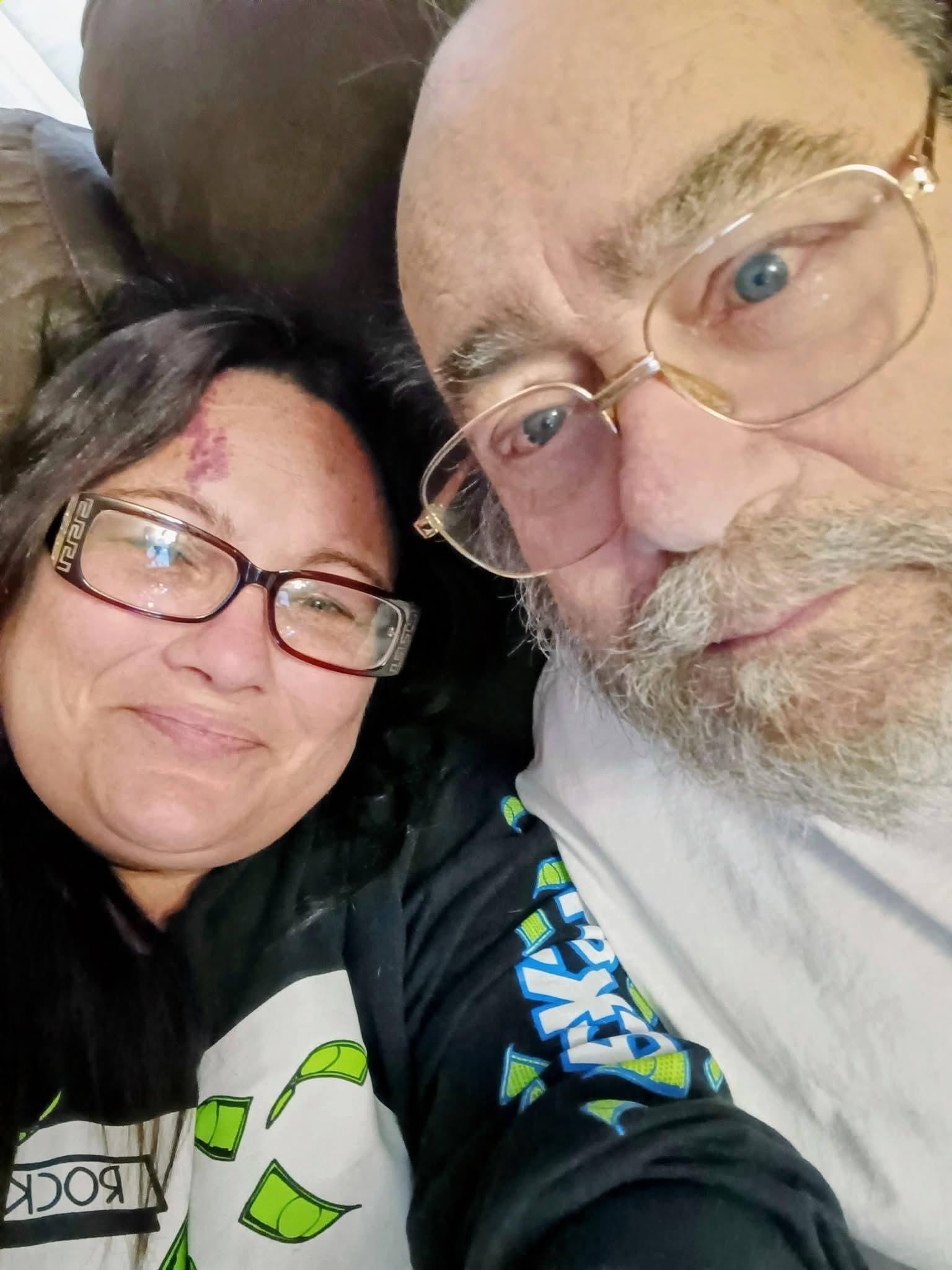 A man and woman taking a selfie