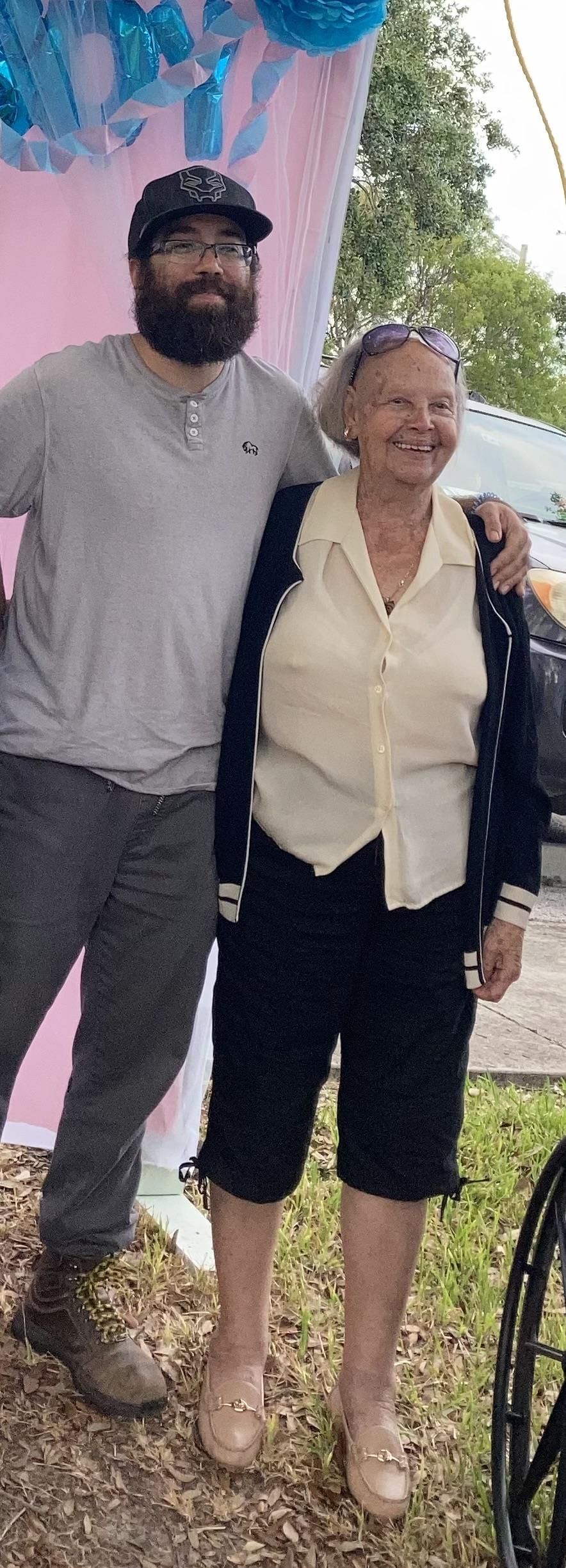 A man and woman posing for a picture