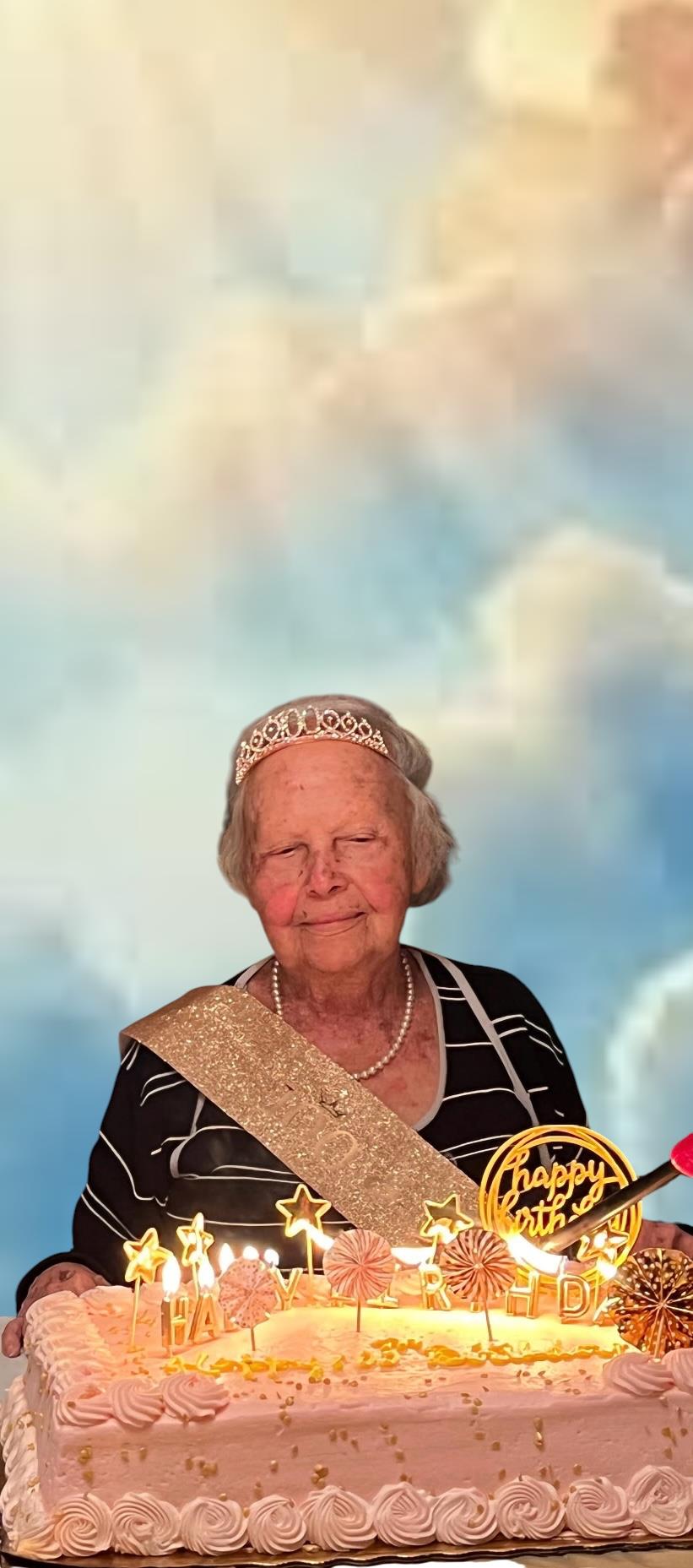 An old woman wearing a tiara and a crown