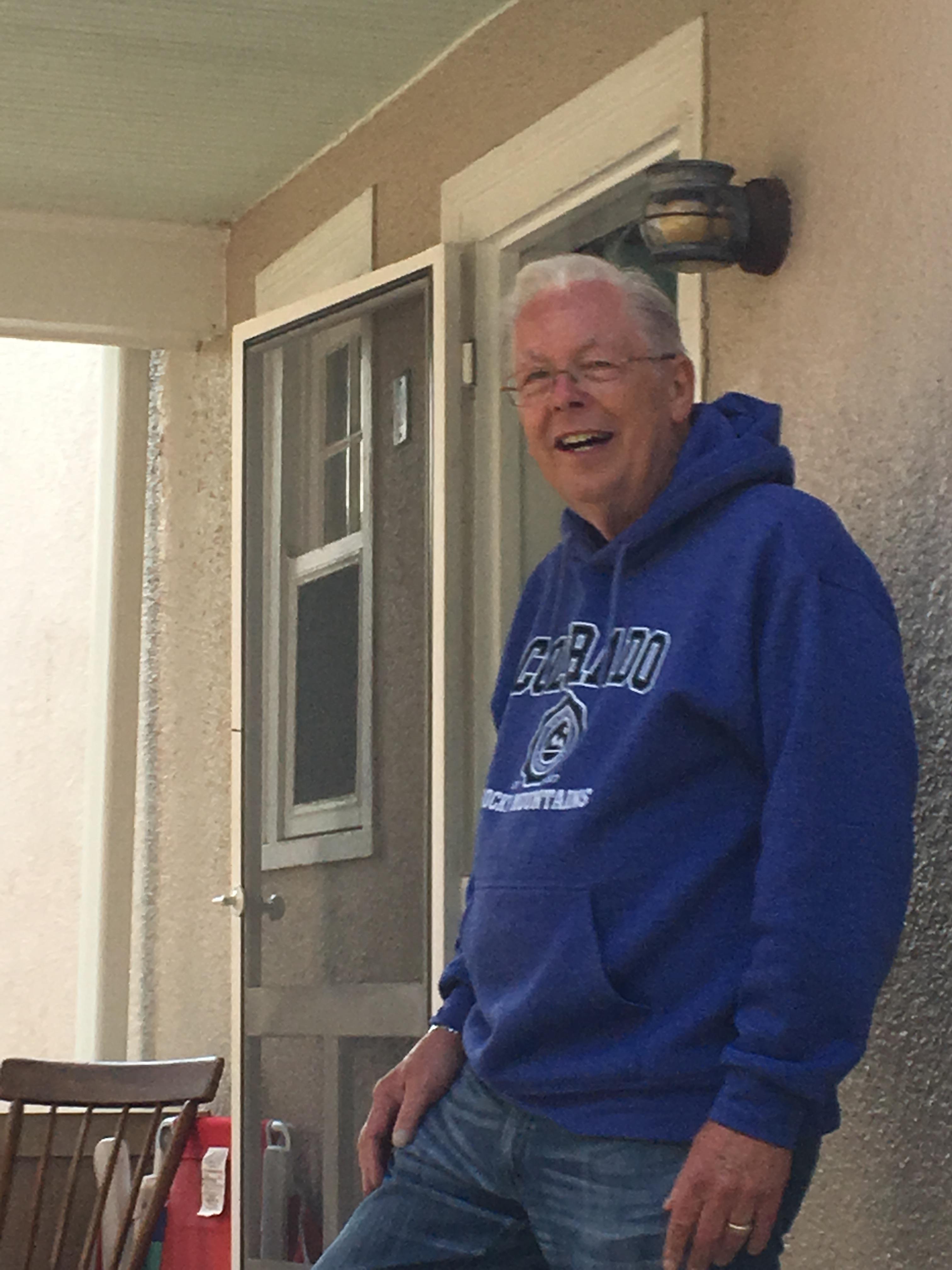 A man in a blue sweatshirt