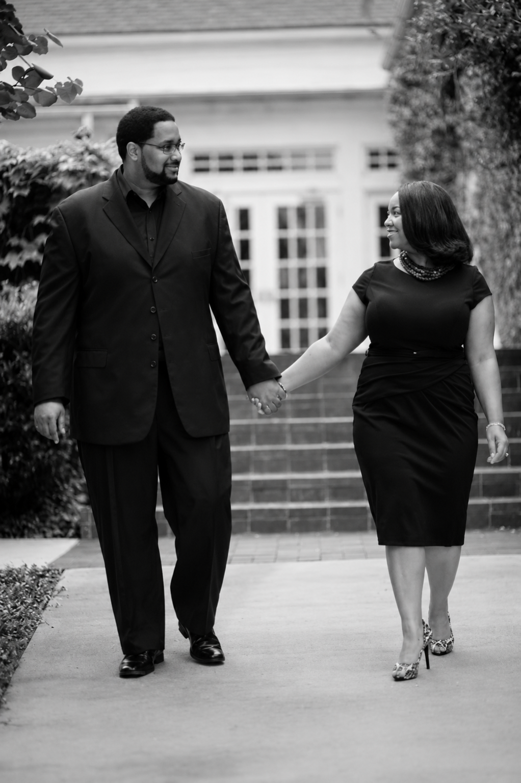 A man and woman holding hands