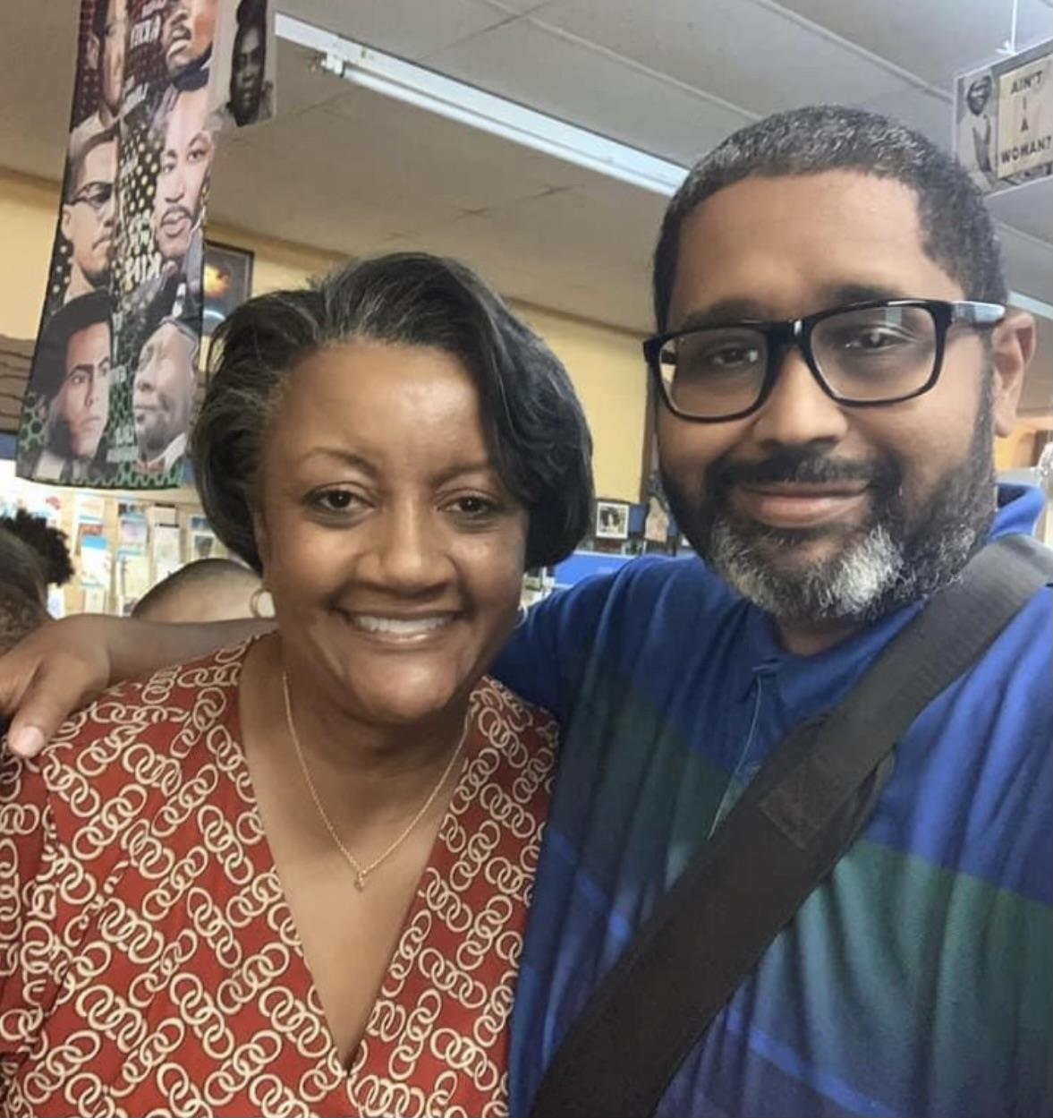 A man and woman posing for a picture