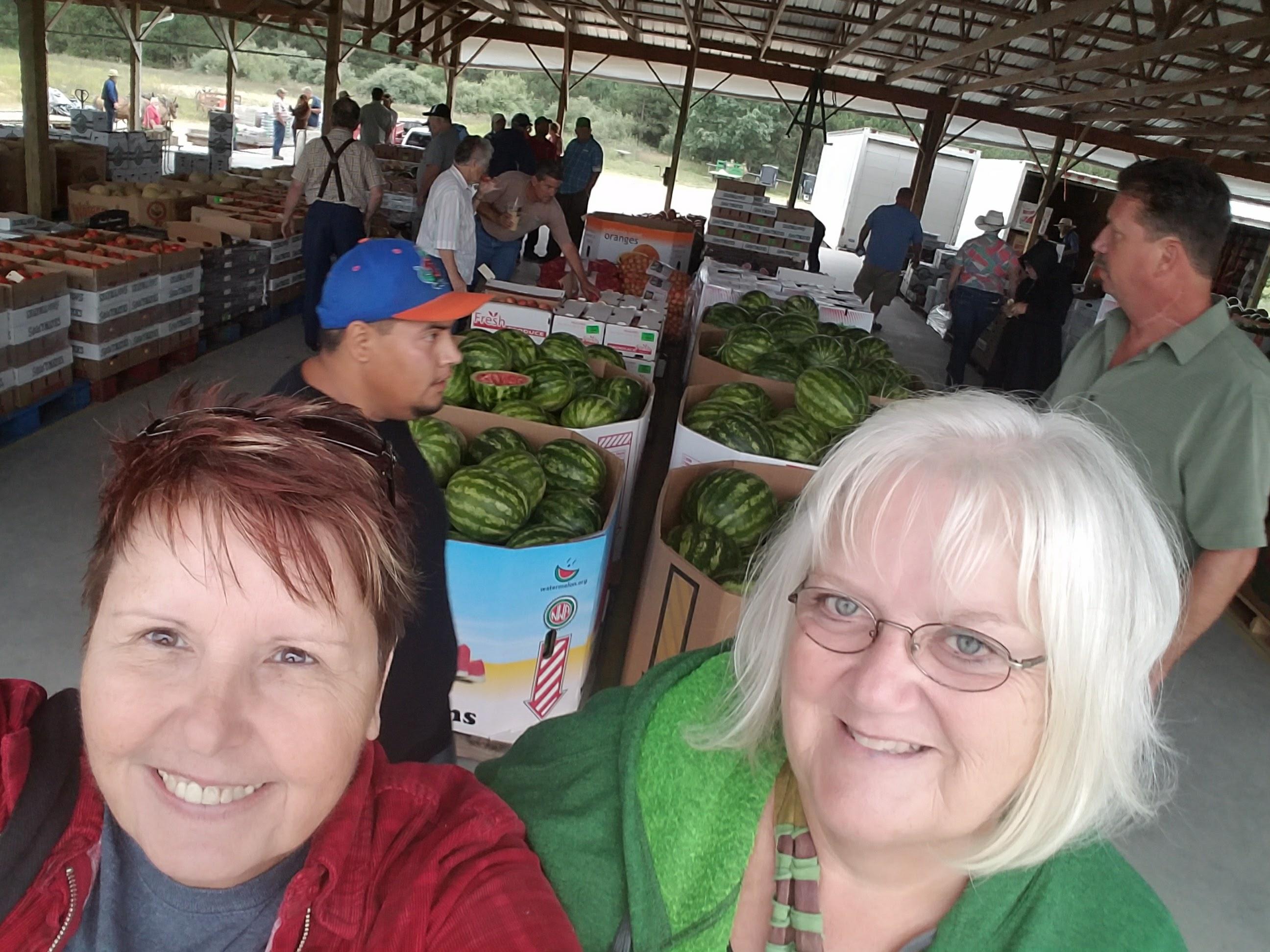 A group of women at a farmers market