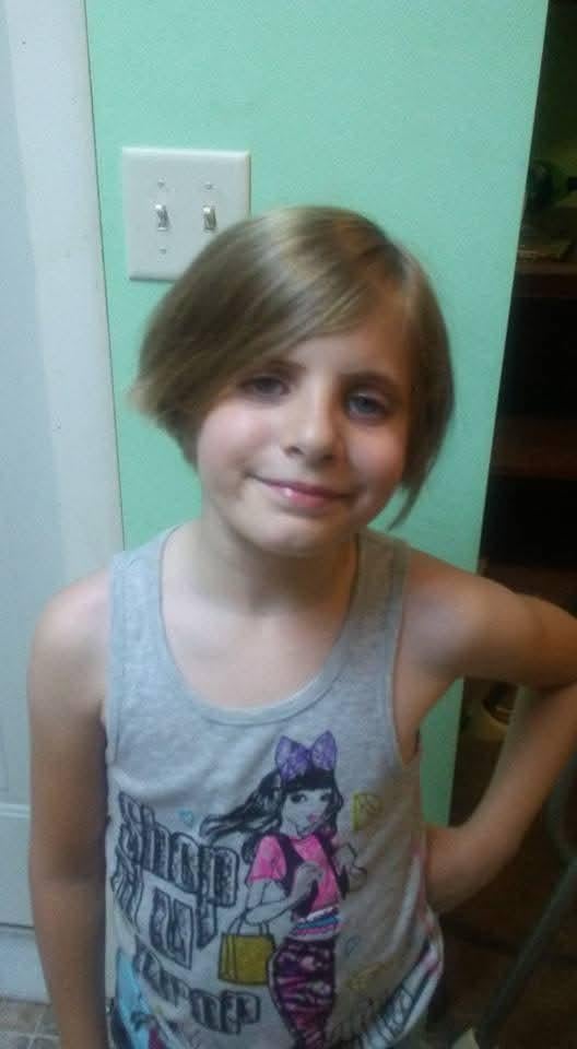 A girl smiling at the camera