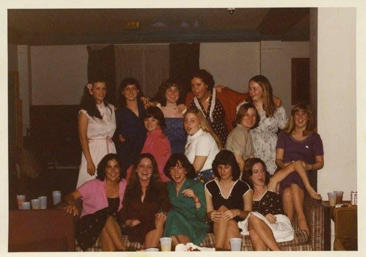 A group of women posing for a photo