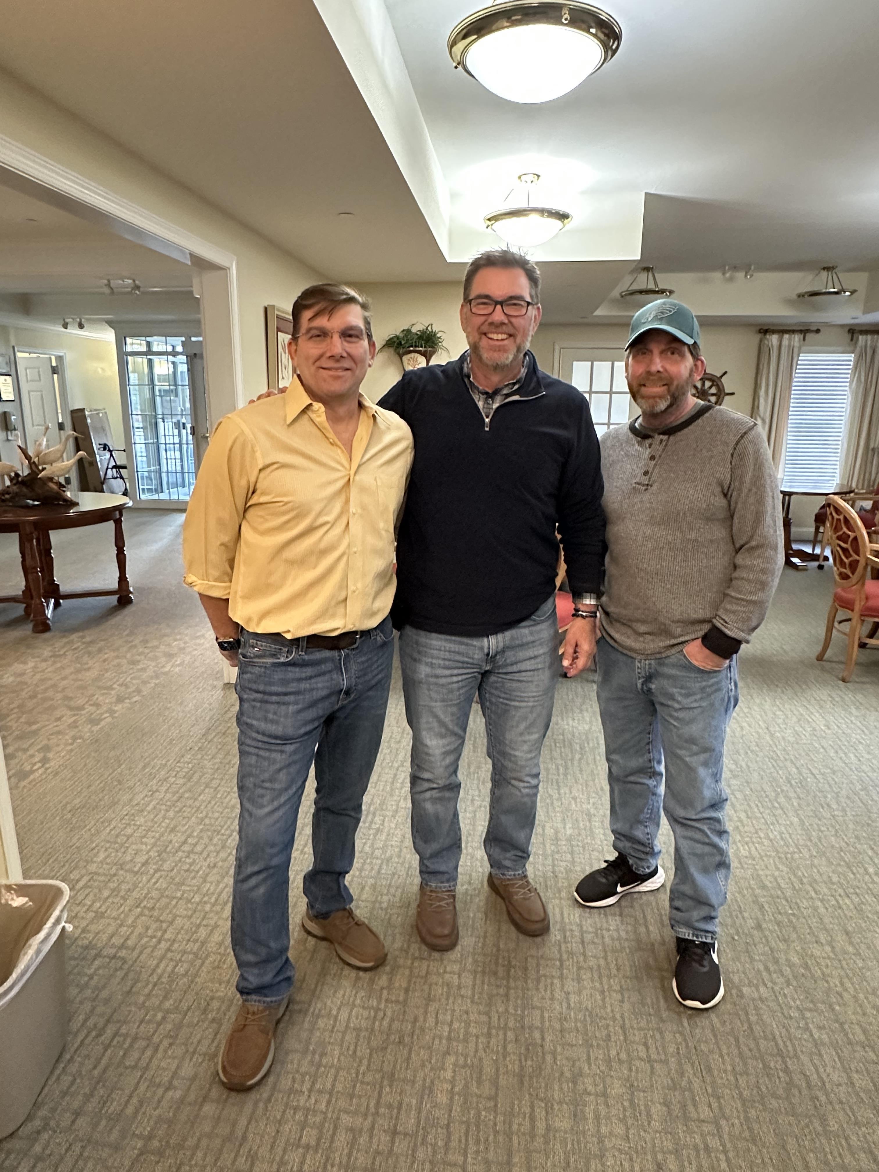 A group of men standing in a room