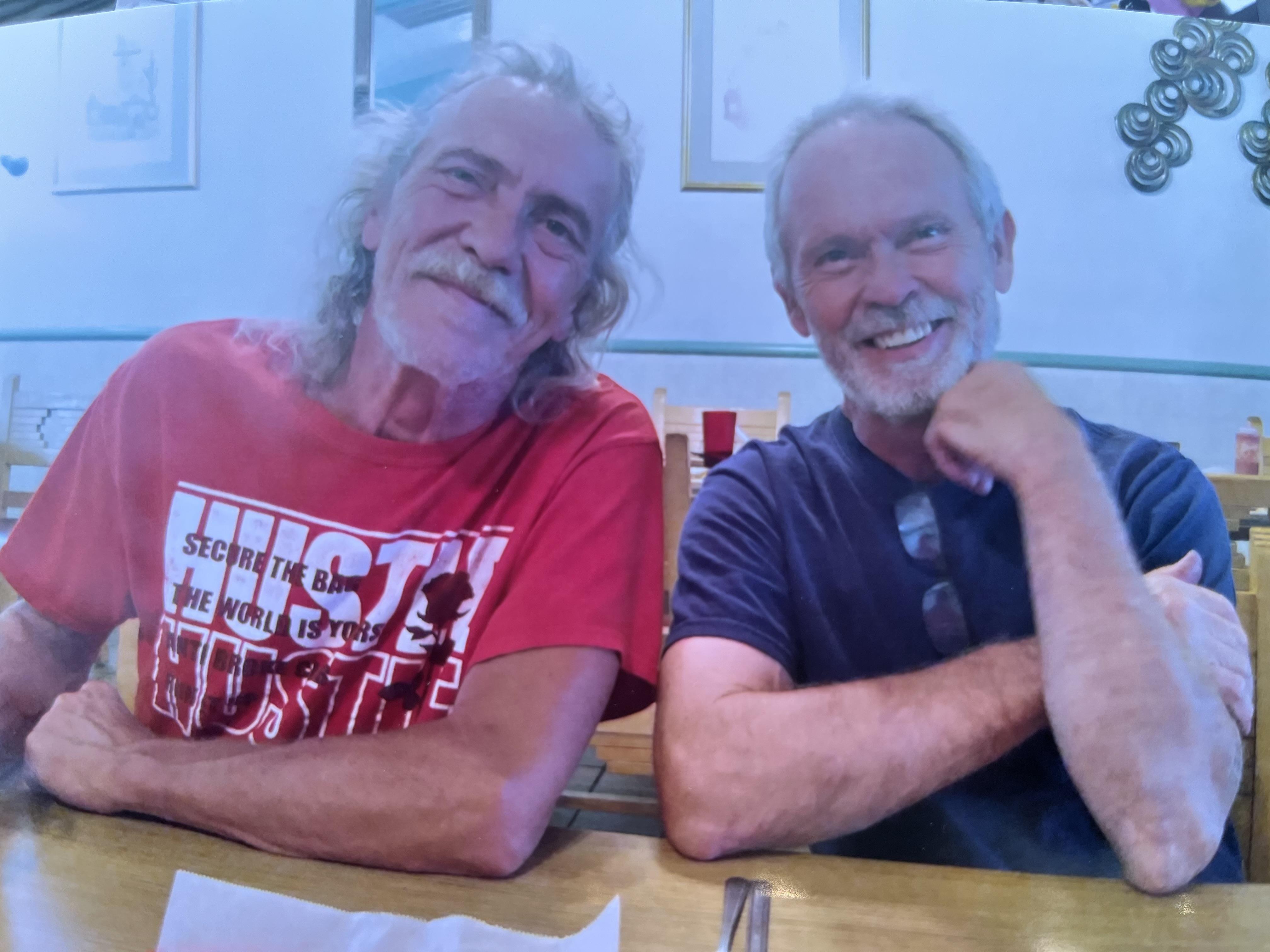 Two men sitting at a table