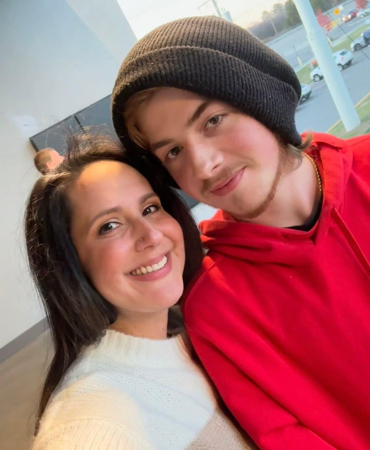A man and woman taking a selfie