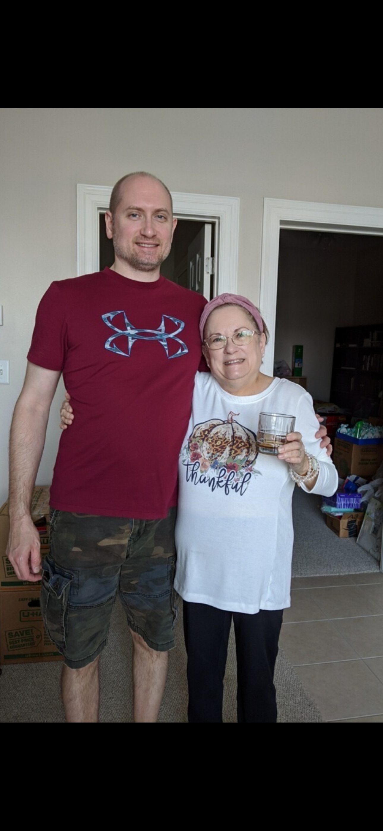 A man and woman posing for a picture