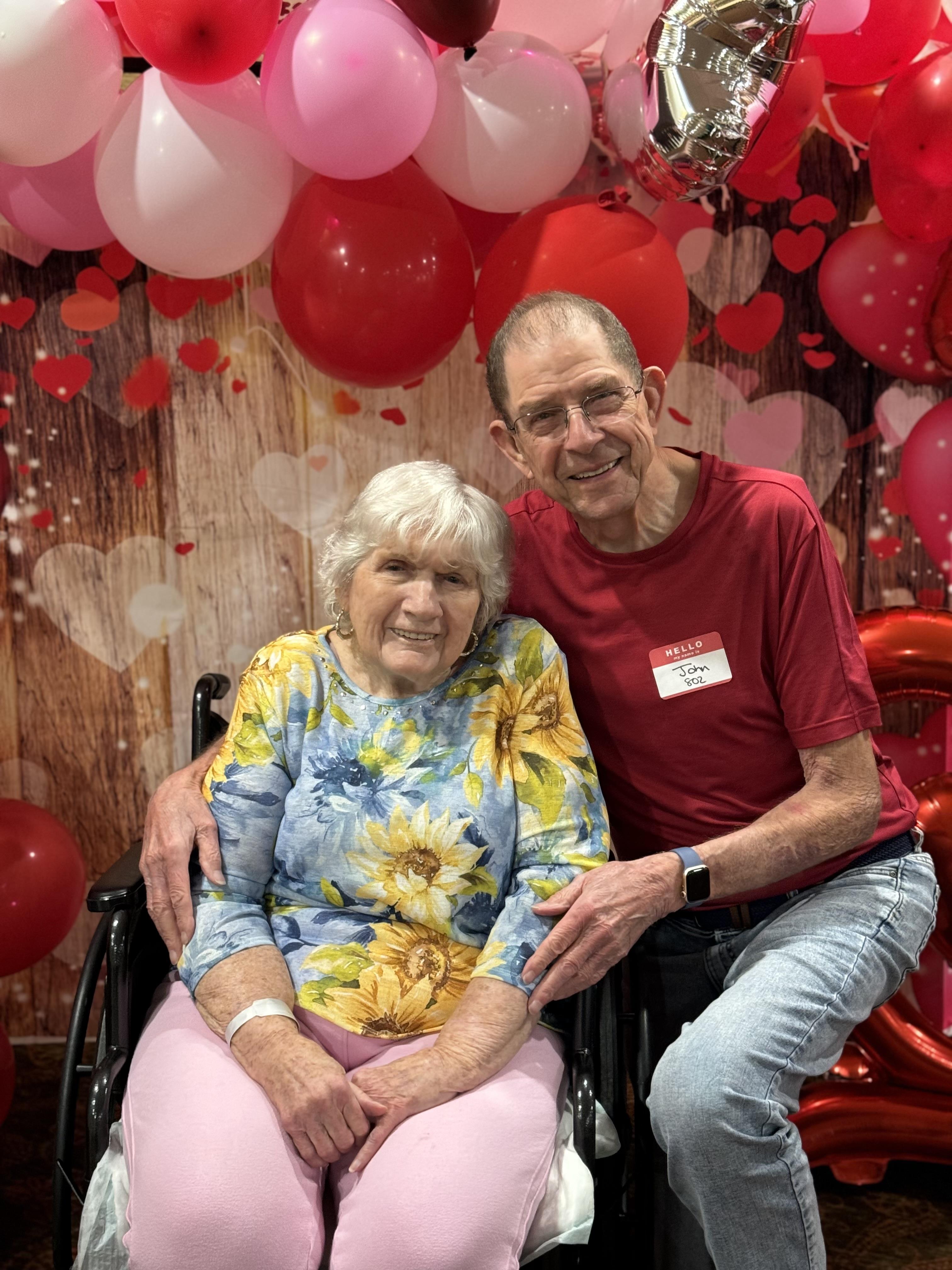 A man and woman posing for a picture