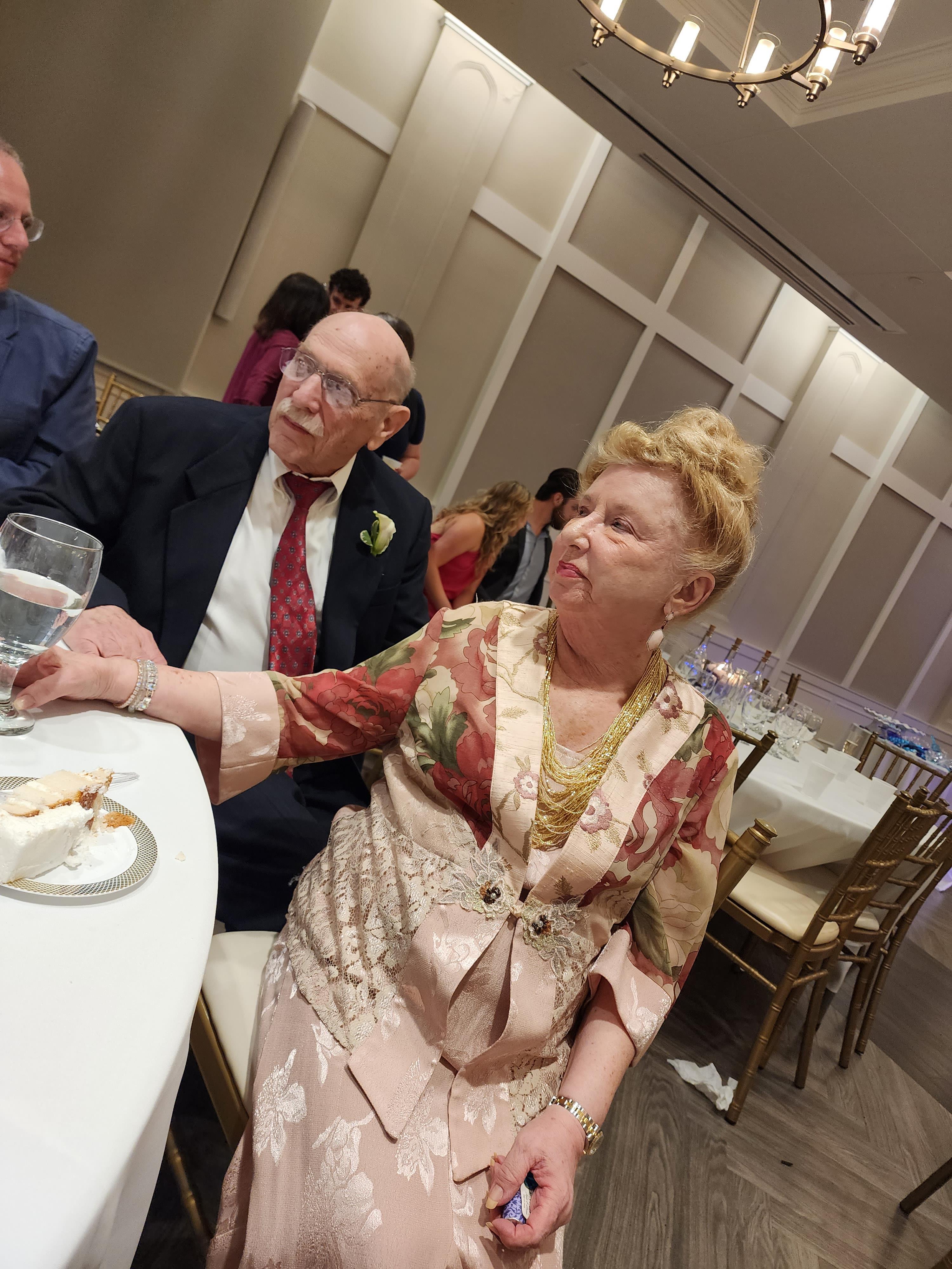 A man and woman sitting at a table