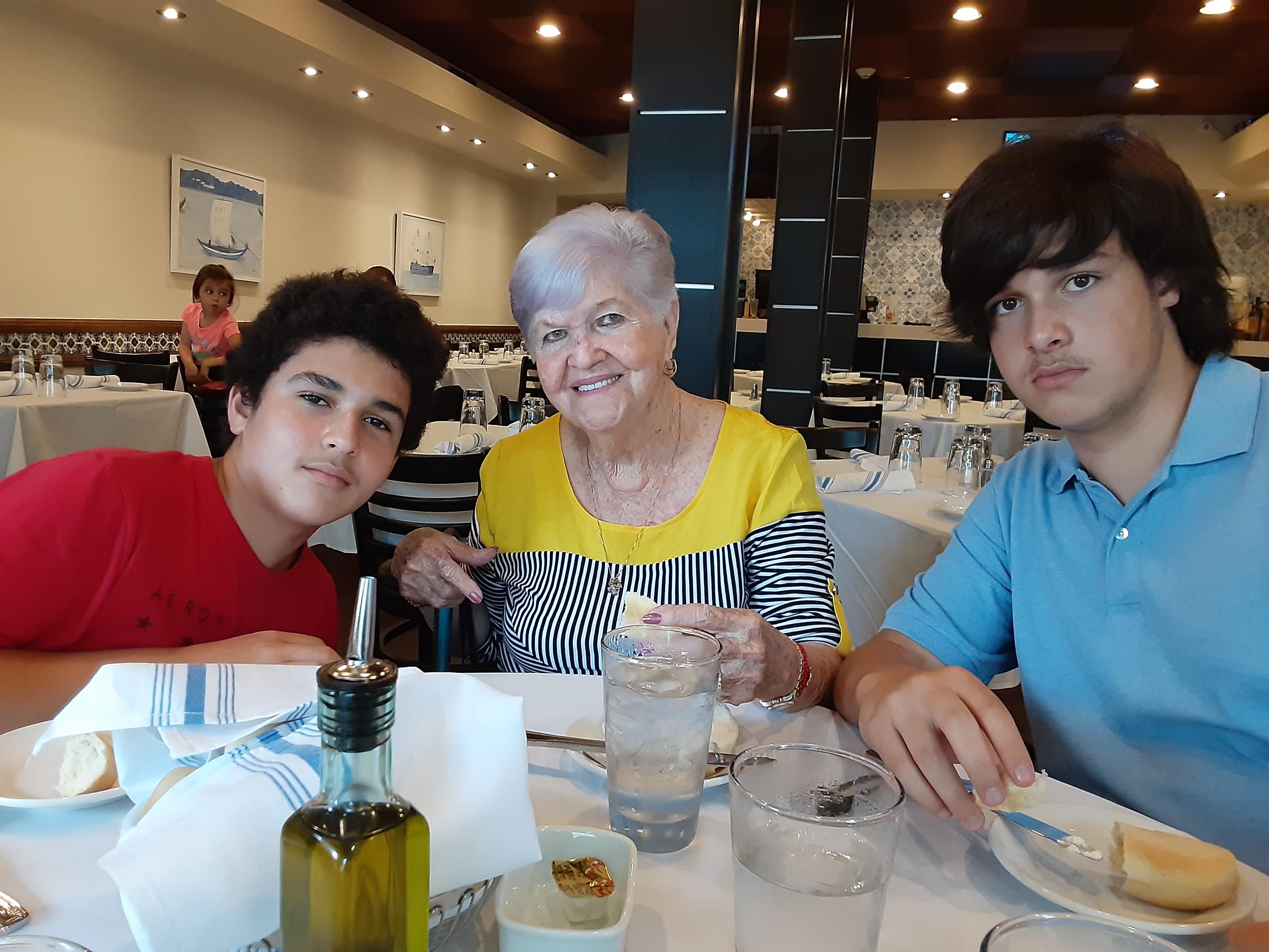 A group of people sitting at a table