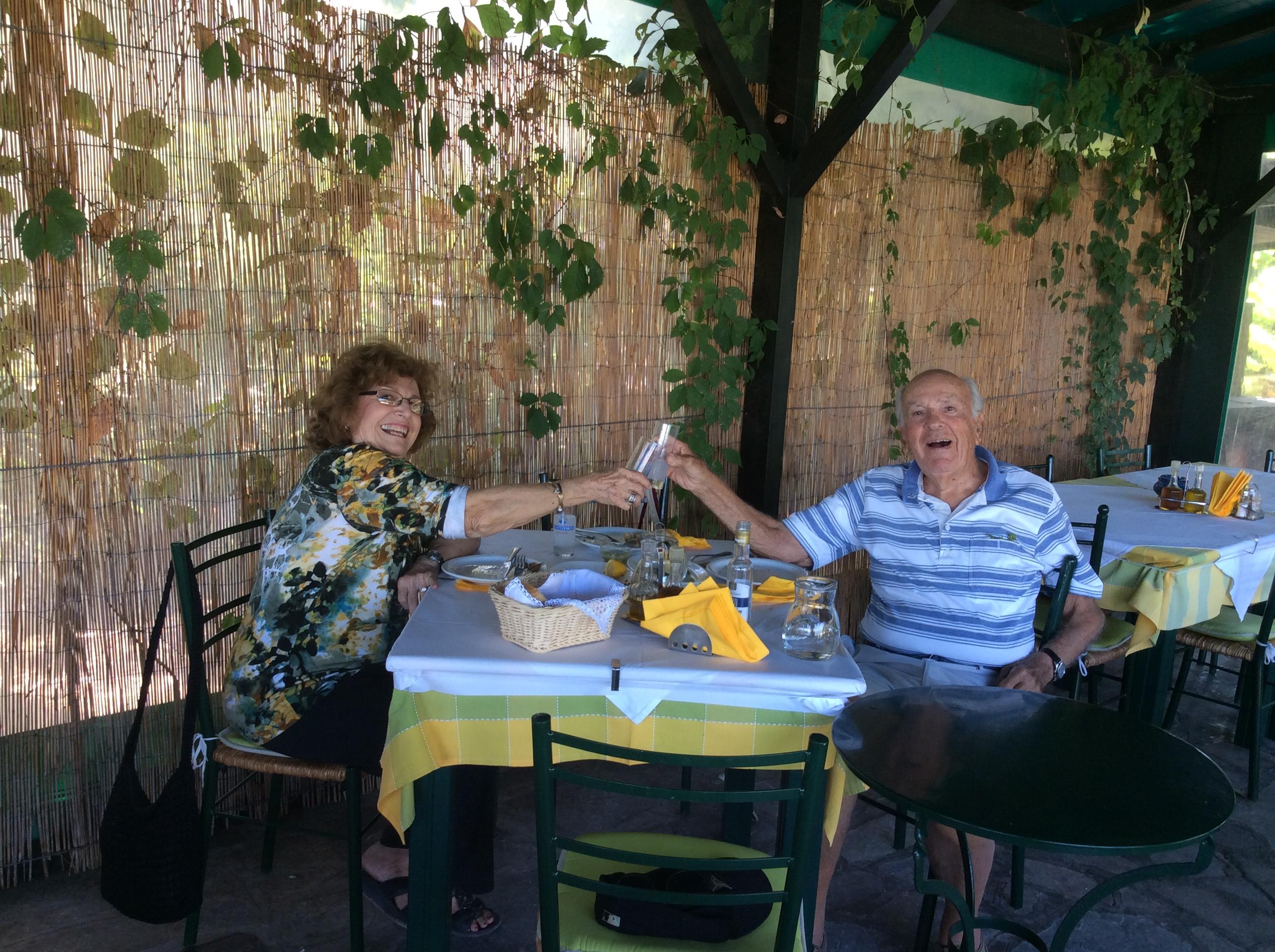 A man and woman sitting at a table
