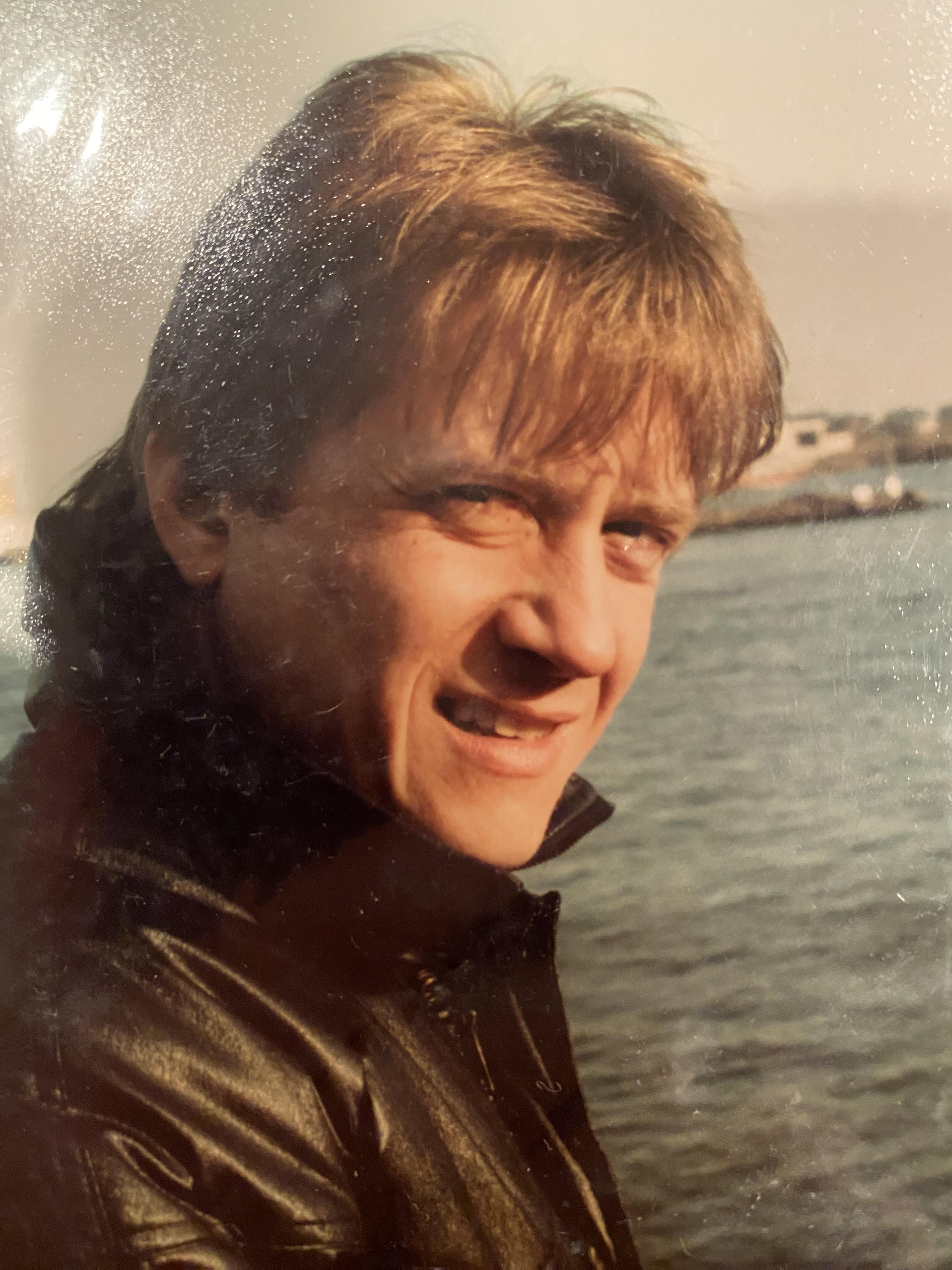 A man smiling at the camera
