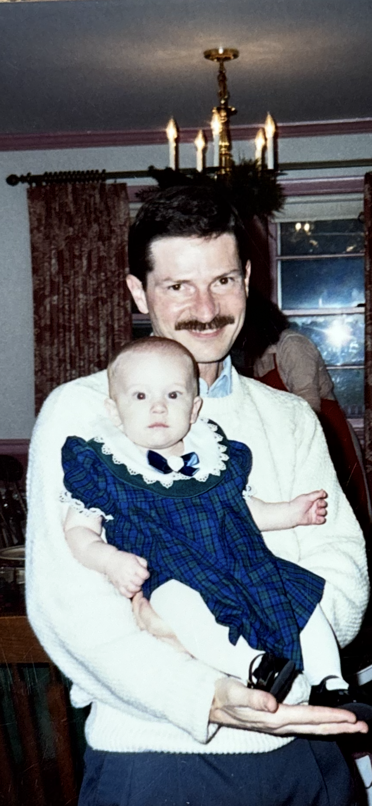 A man holding a baby
