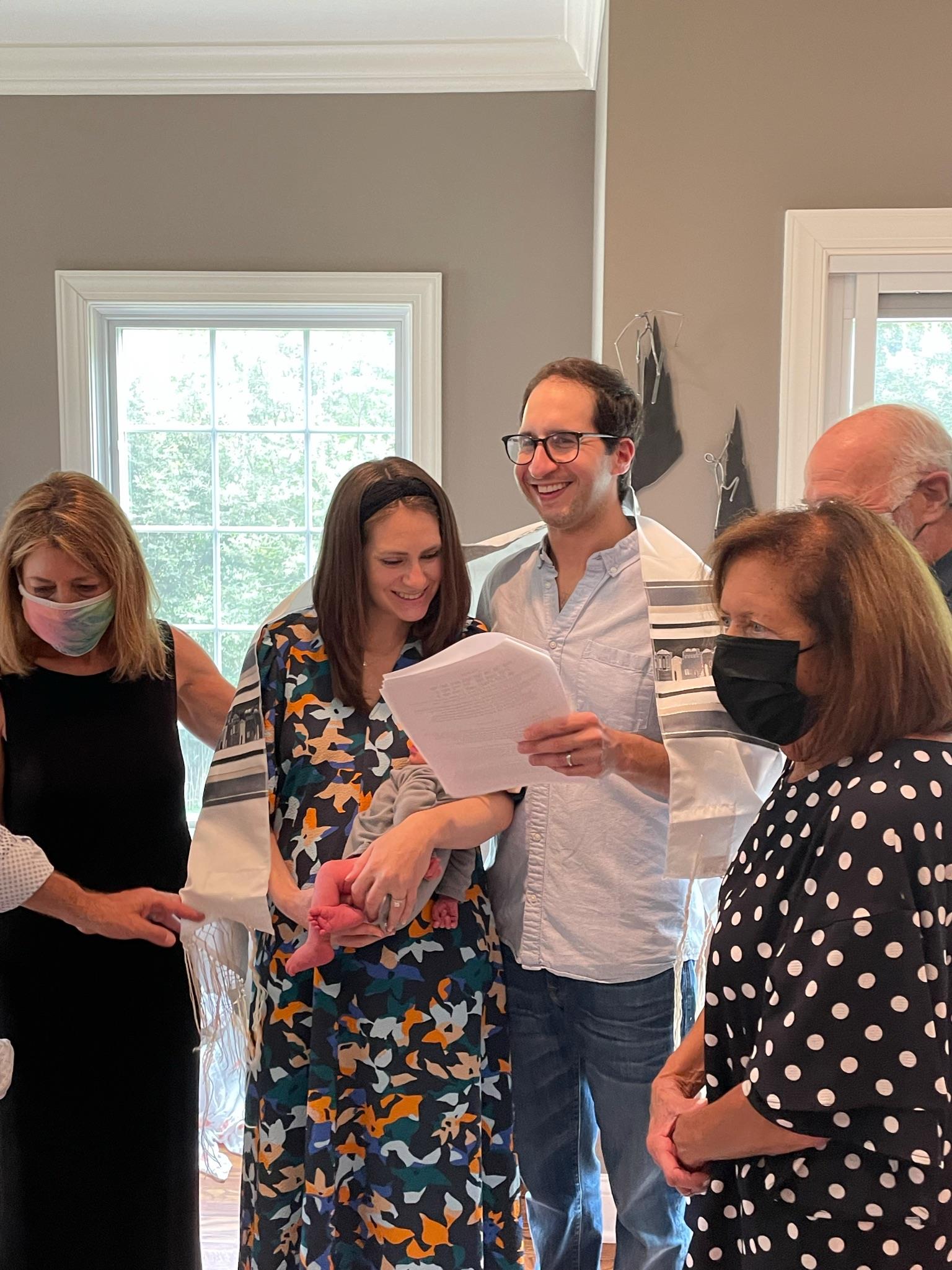 A group of people standing in a room