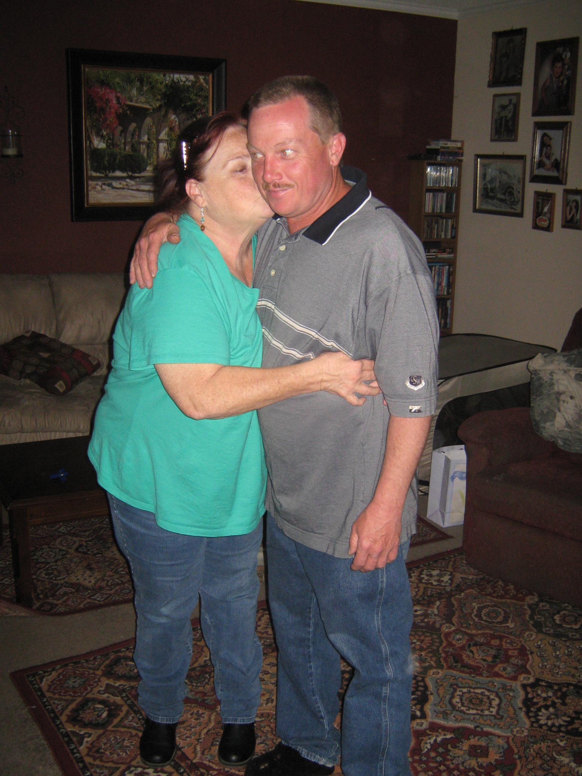 A man and woman kissing