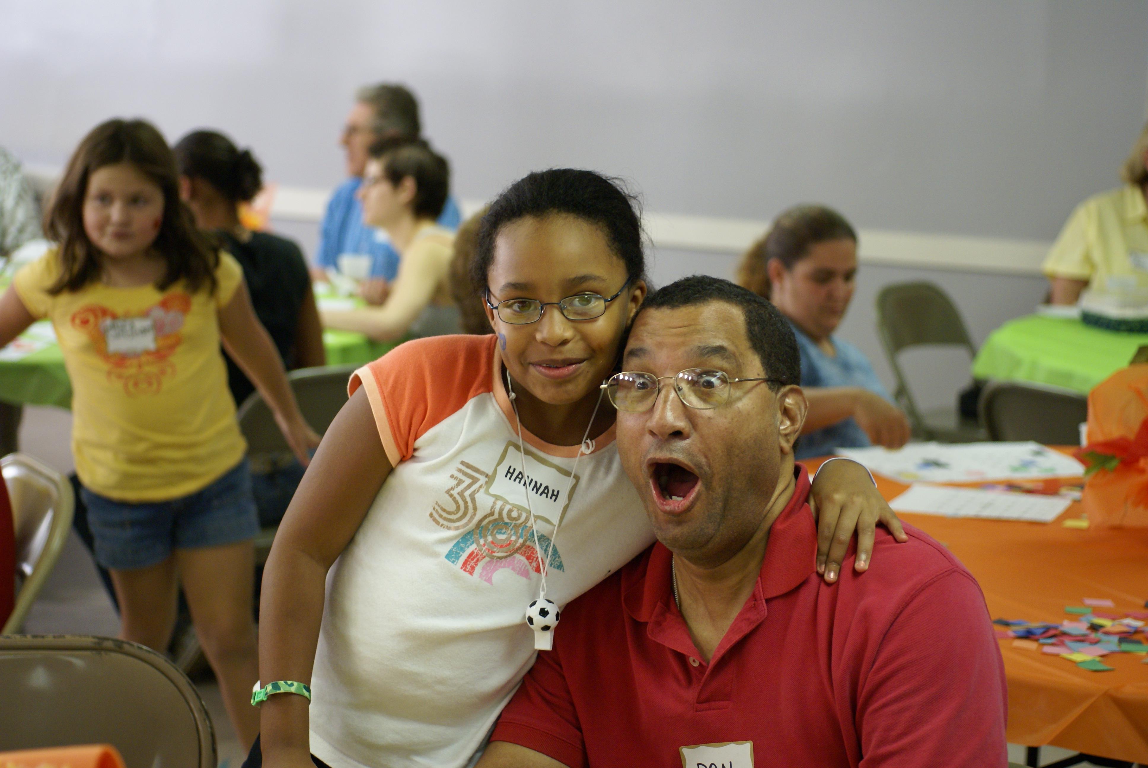 A man and a woman posing for a picture