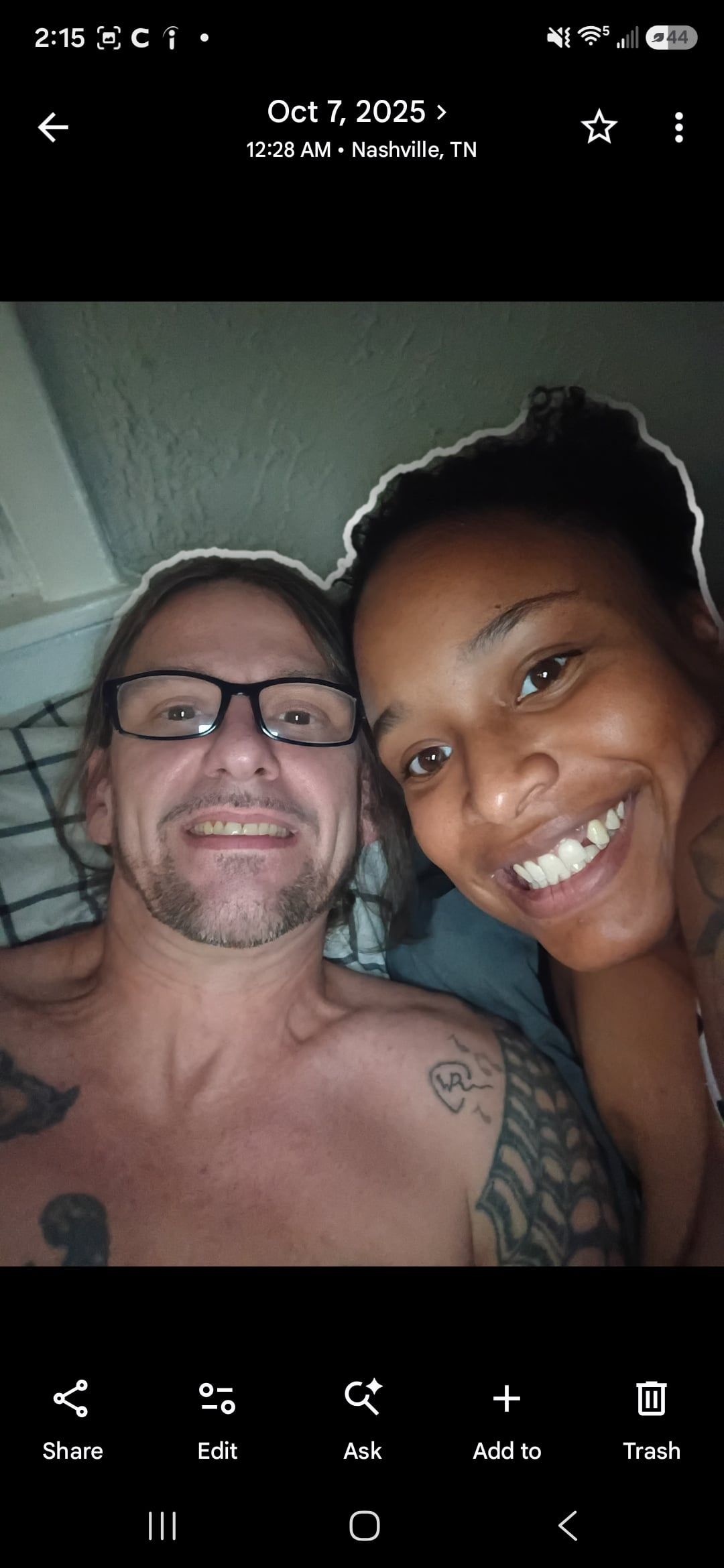 A man and woman taking a selfie
