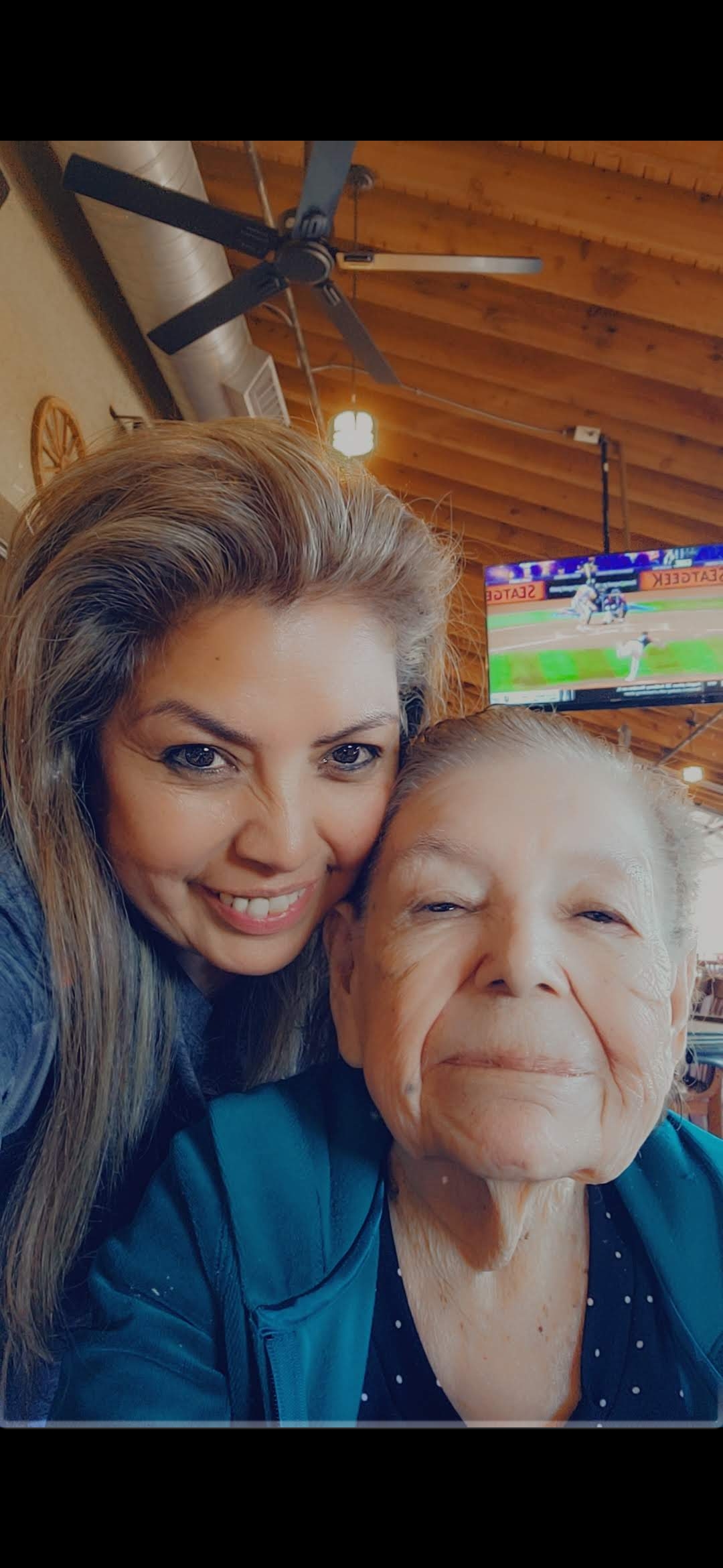 A woman and an older woman taking a selfie
