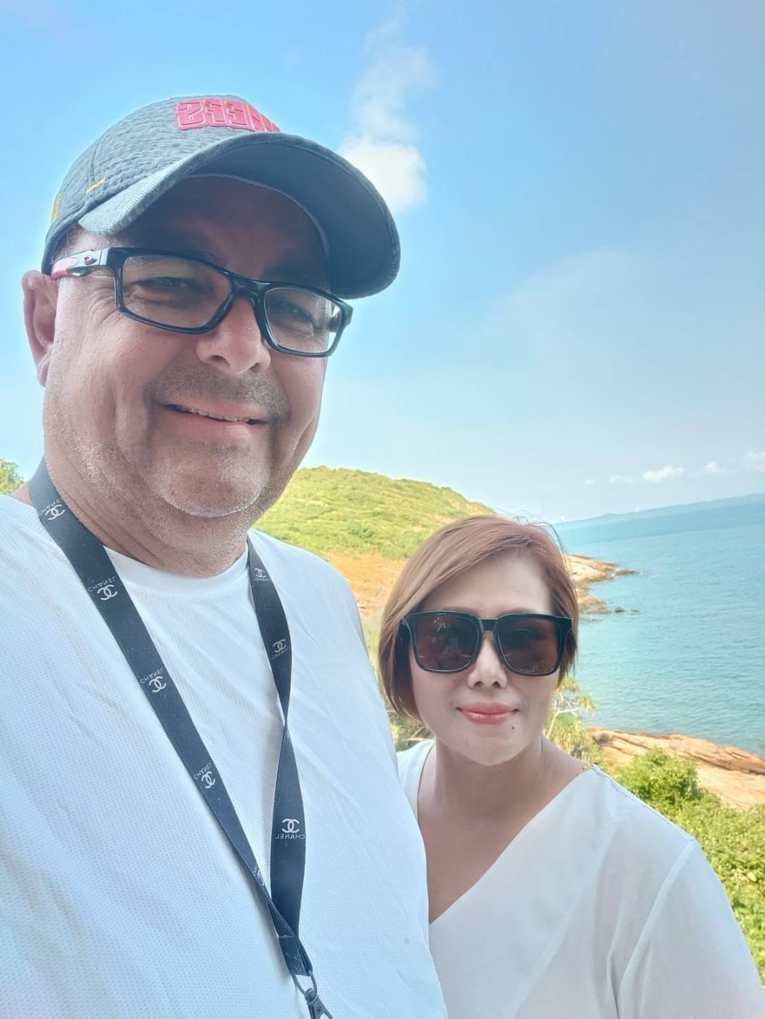 A man and woman taking a selfie