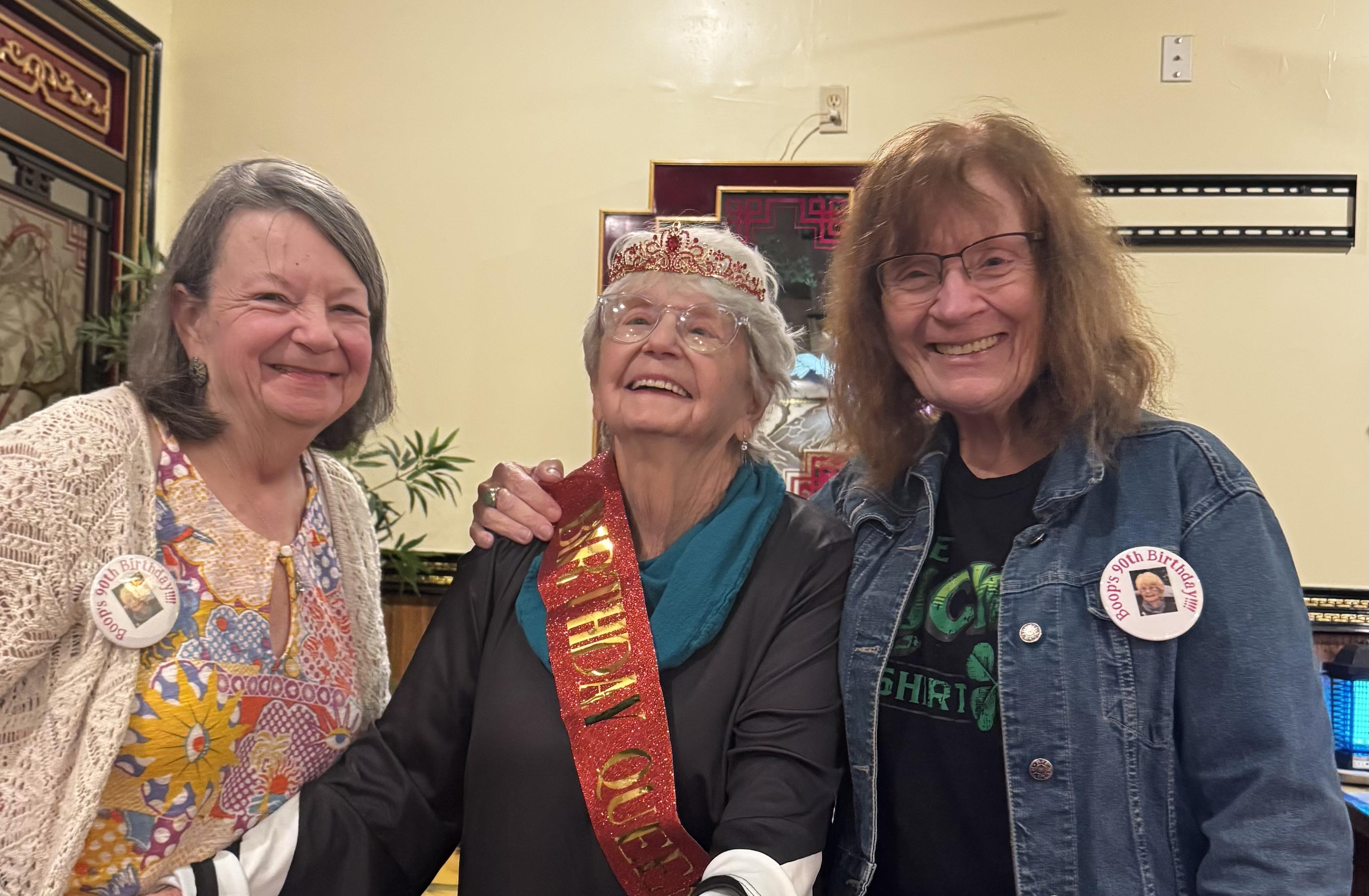 A group of women smiling for a photo