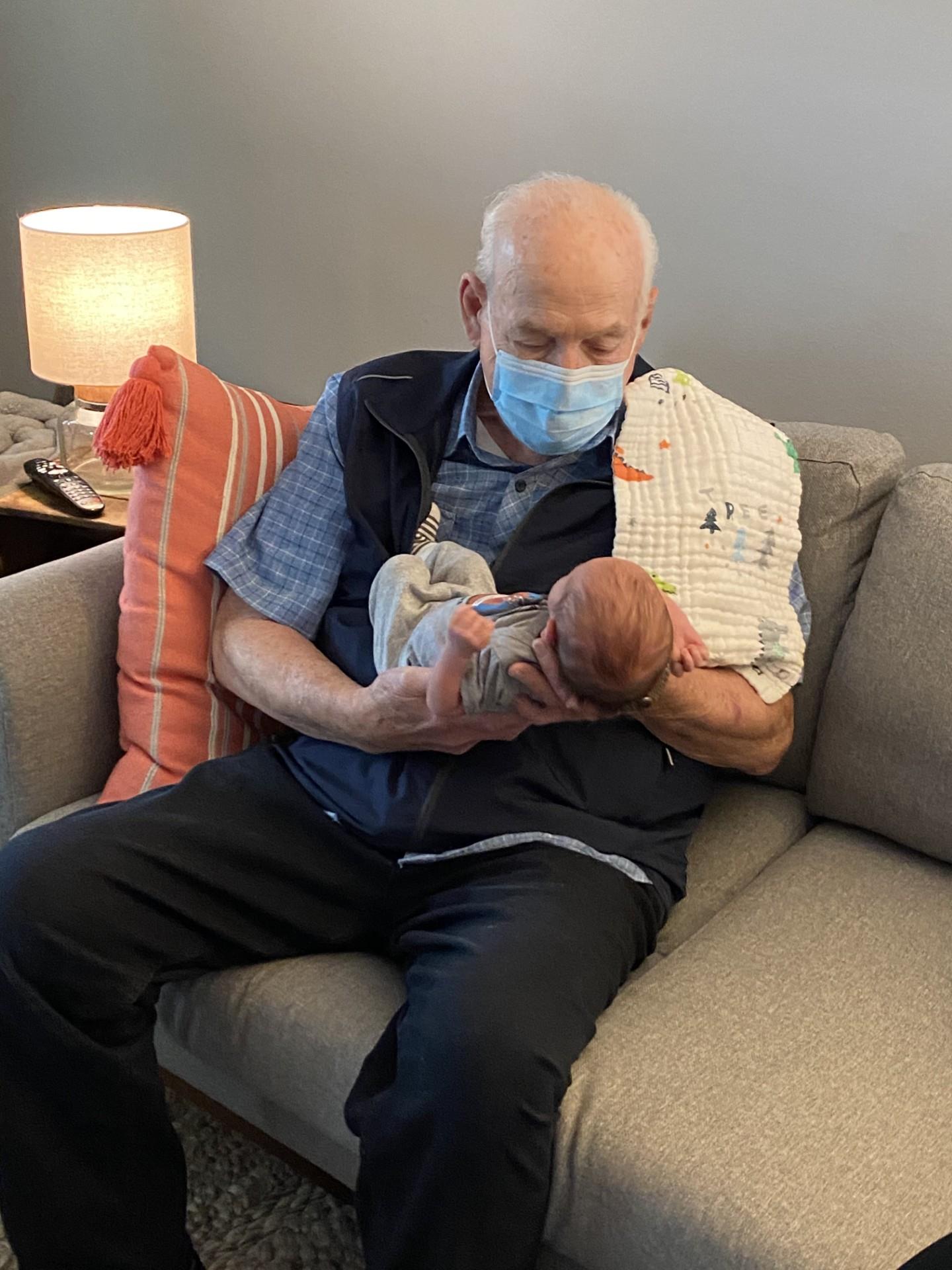 A man holding a baby