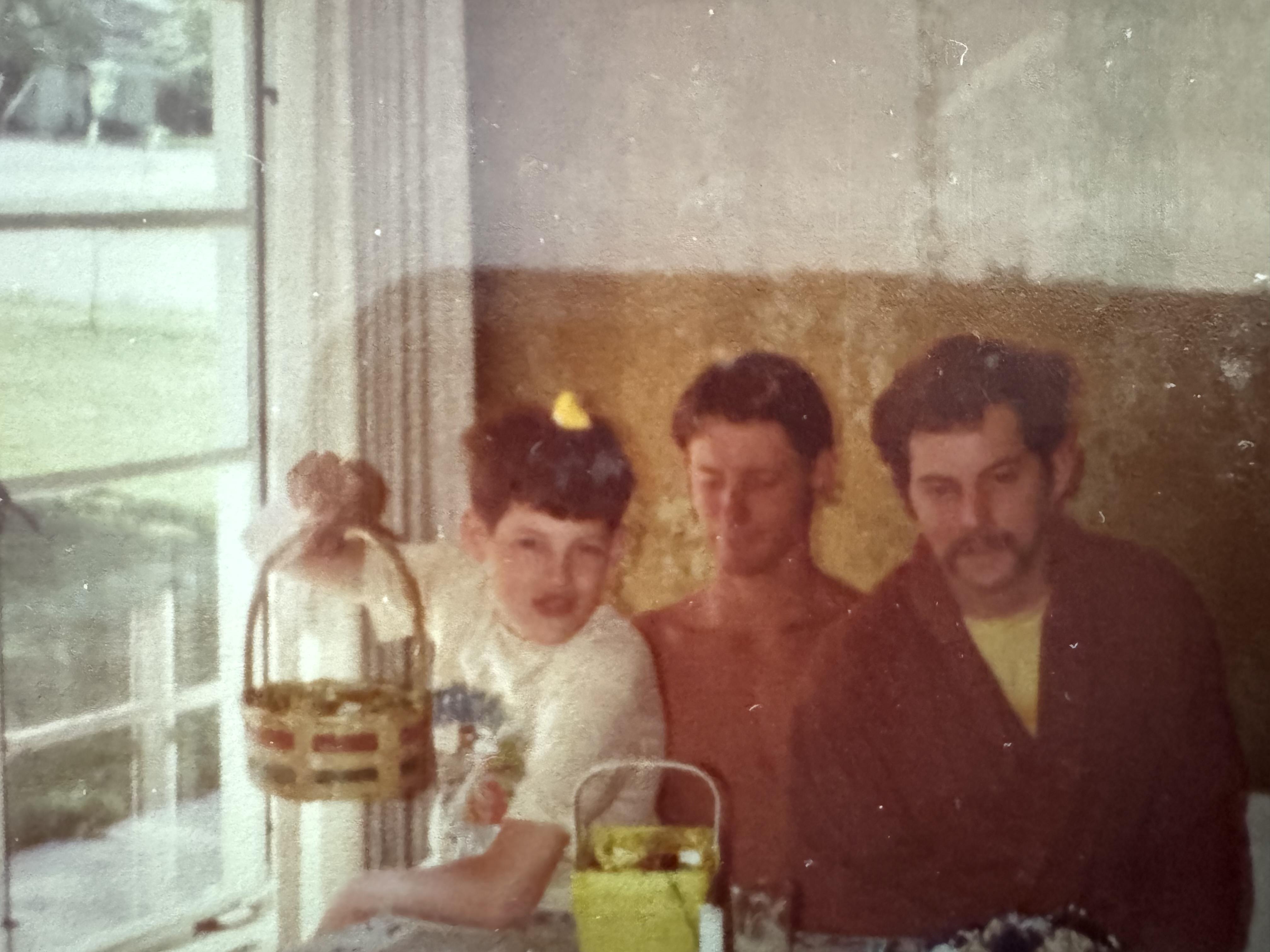 A group of men sitting at a table