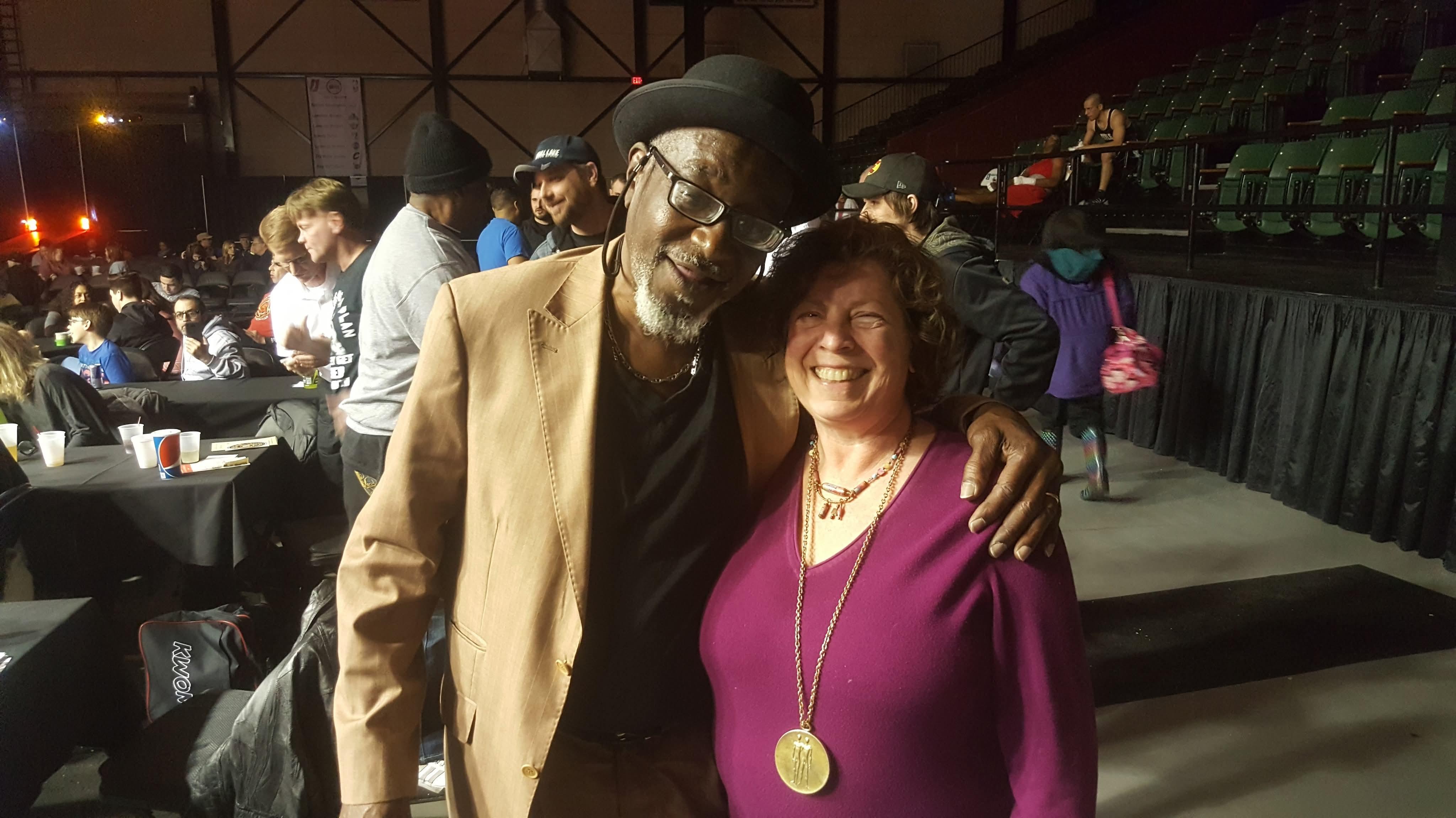 A man and woman posing for a picture