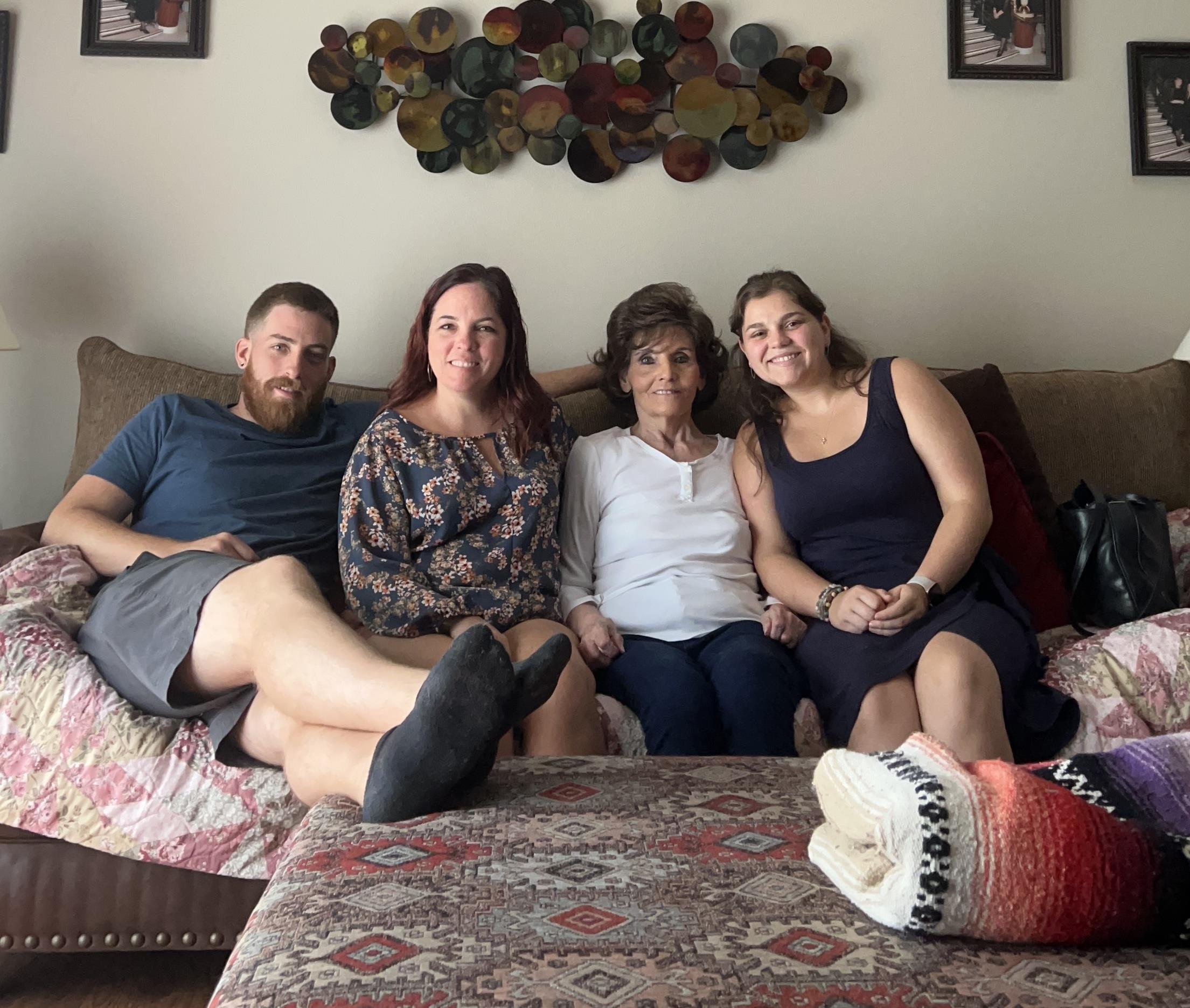 A group of people sitting on a couch