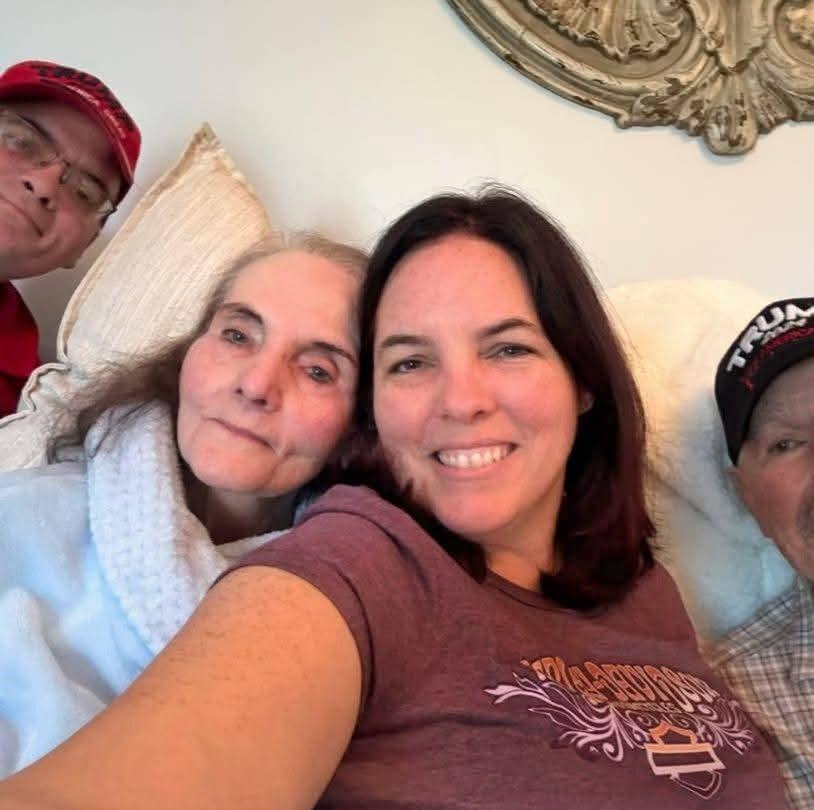 A group of people taking a selfie