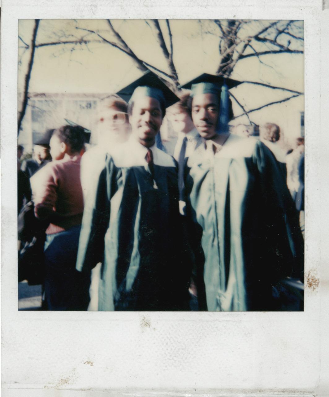 A group of people in graduation gowns