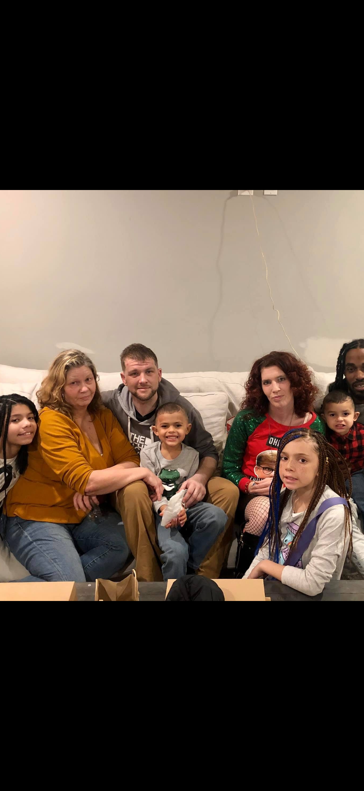 A group of people sitting on a couch
