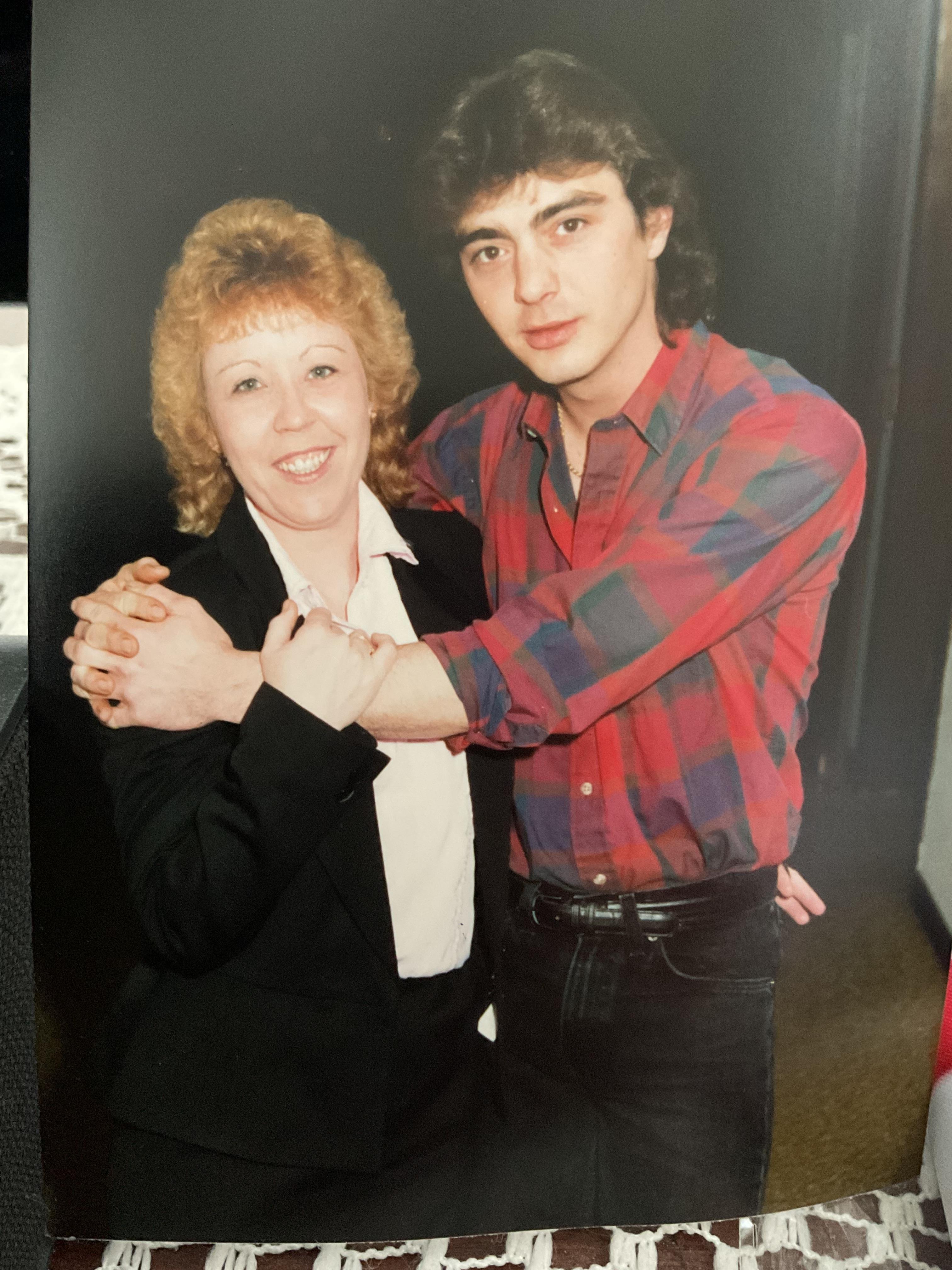 A man and woman posing for a picture