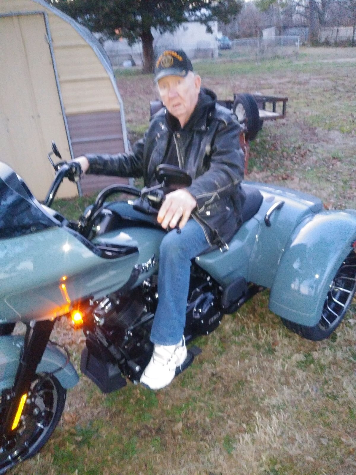 A man sitting on a motorcycle